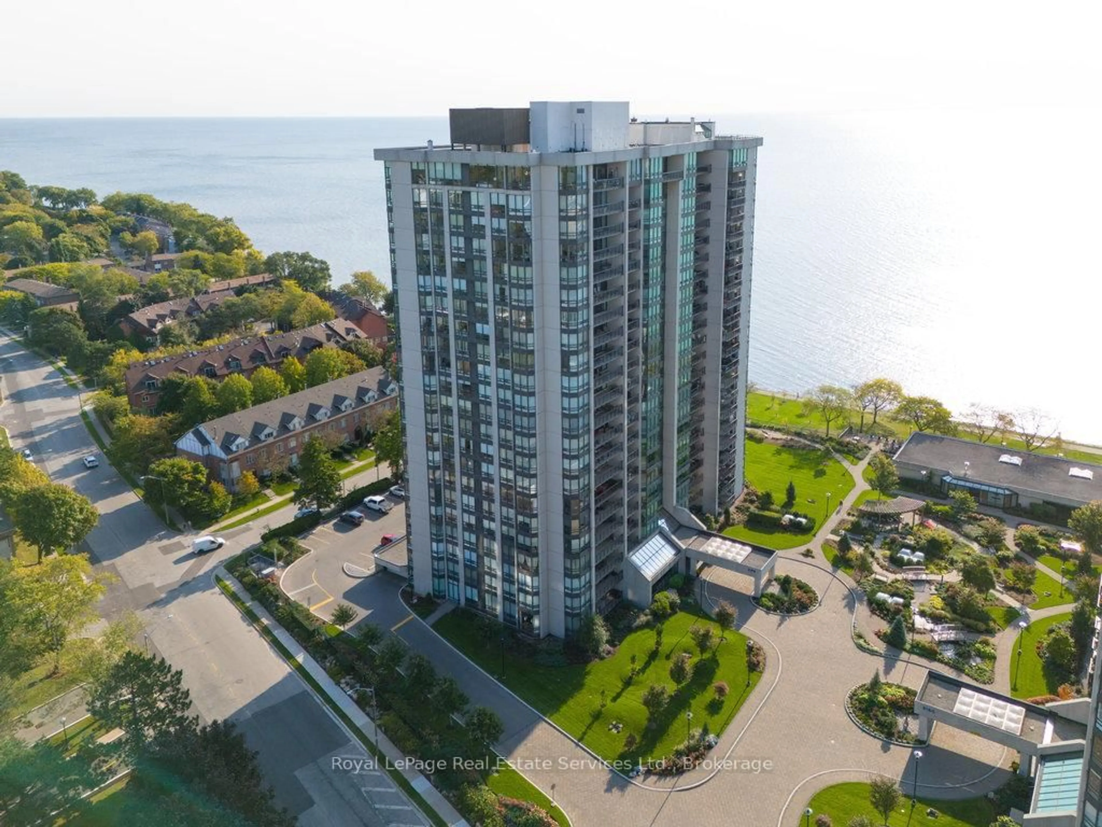 A pic from outside/outdoor area/front of a property/back of a property/a pic from drone, water/lake/river/ocean view for 2170 Marine Dr #701, Oakville Ontario L6L 5V1