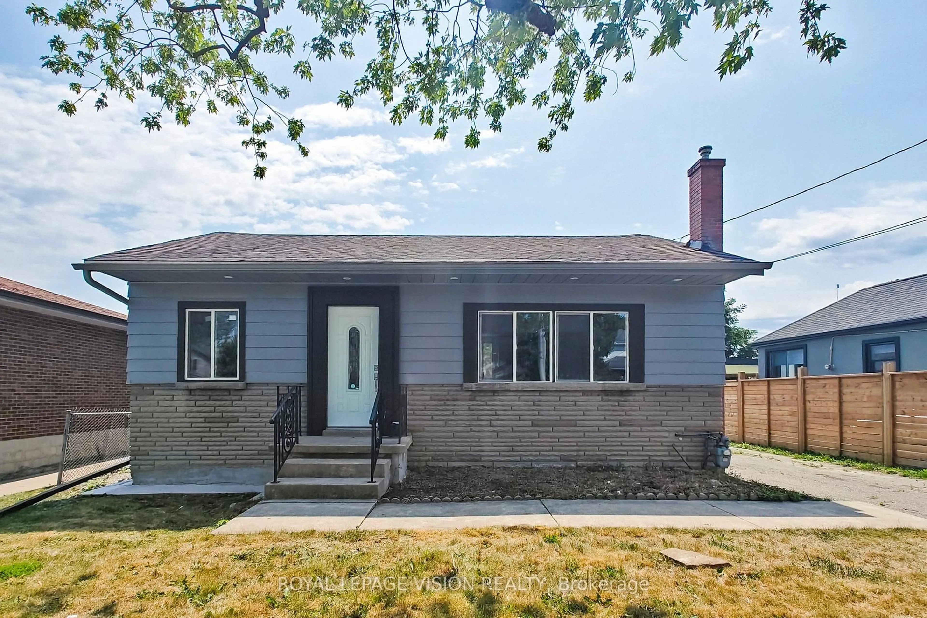 Home with brick exterior material, street for 406 Marf Ave, Mississauga Ontario L5G 1T3