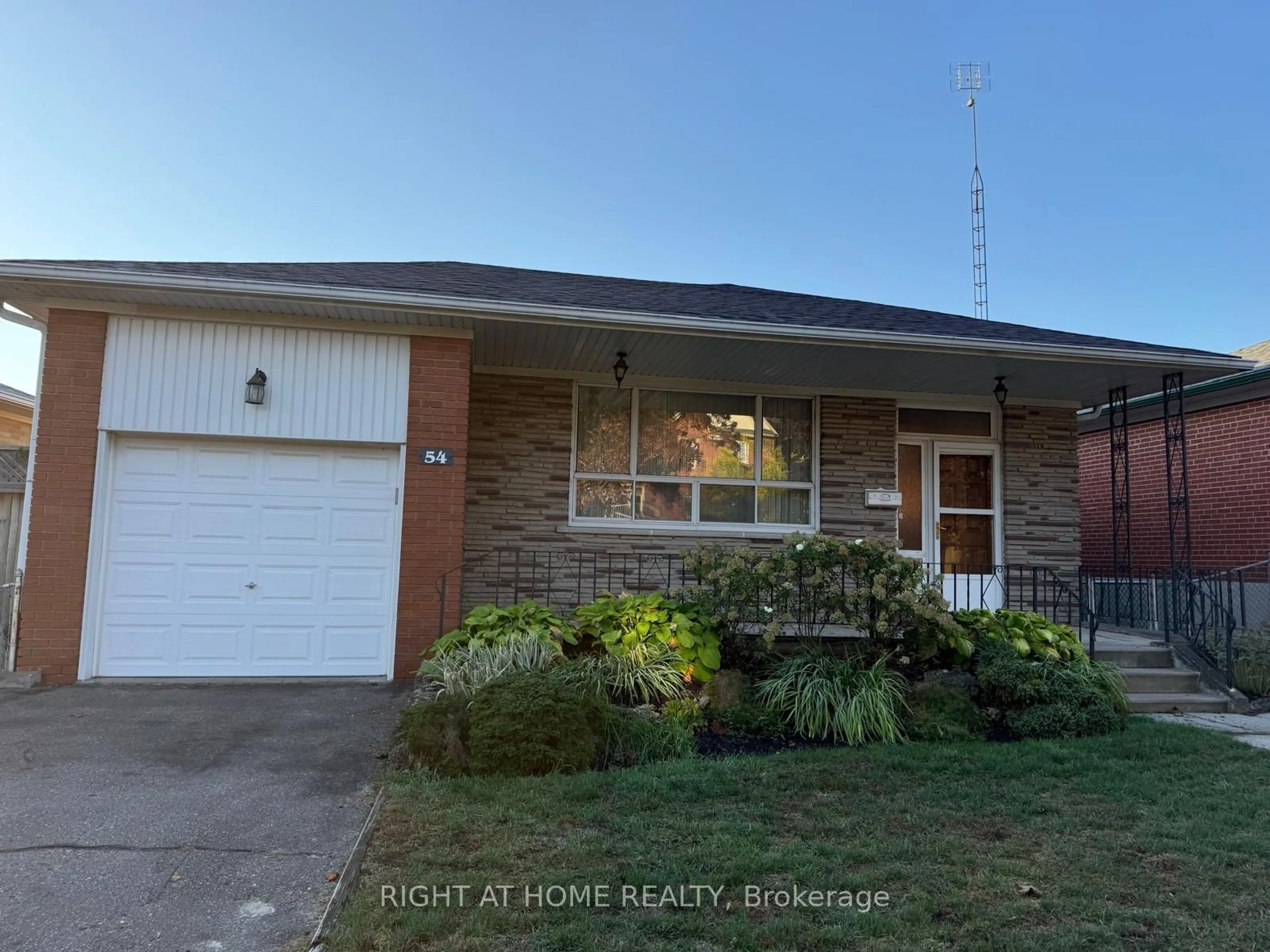 Home with brick exterior material, street for 54 LEMONWOOD Dr, Toronto Ontario M9A 4L5