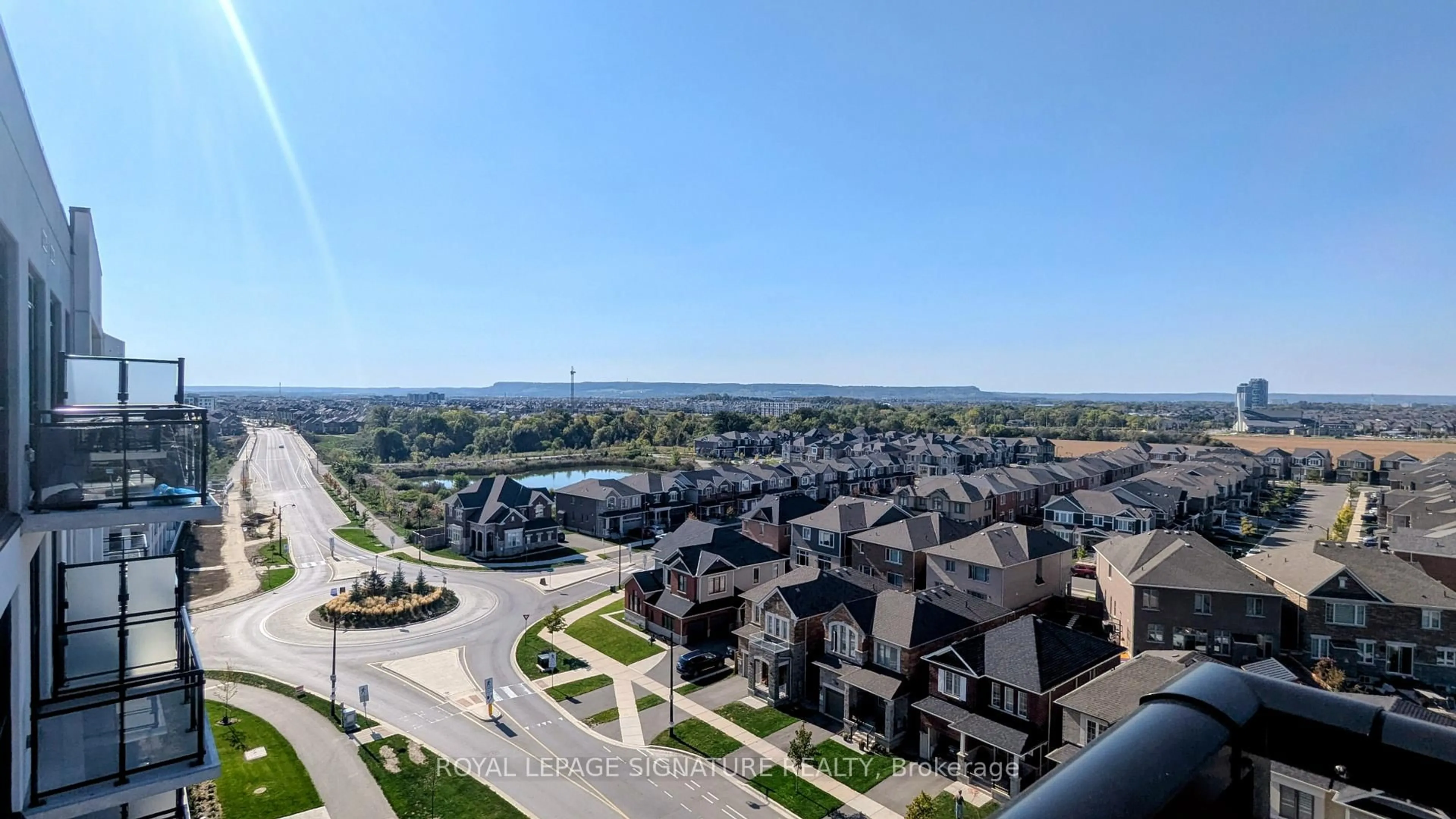A pic from outside/outdoor area/front of a property/back of a property/a pic from drone, city buildings view from balcony for 720 Whitlock Ave #615, Milton Ontario L9E 1S2