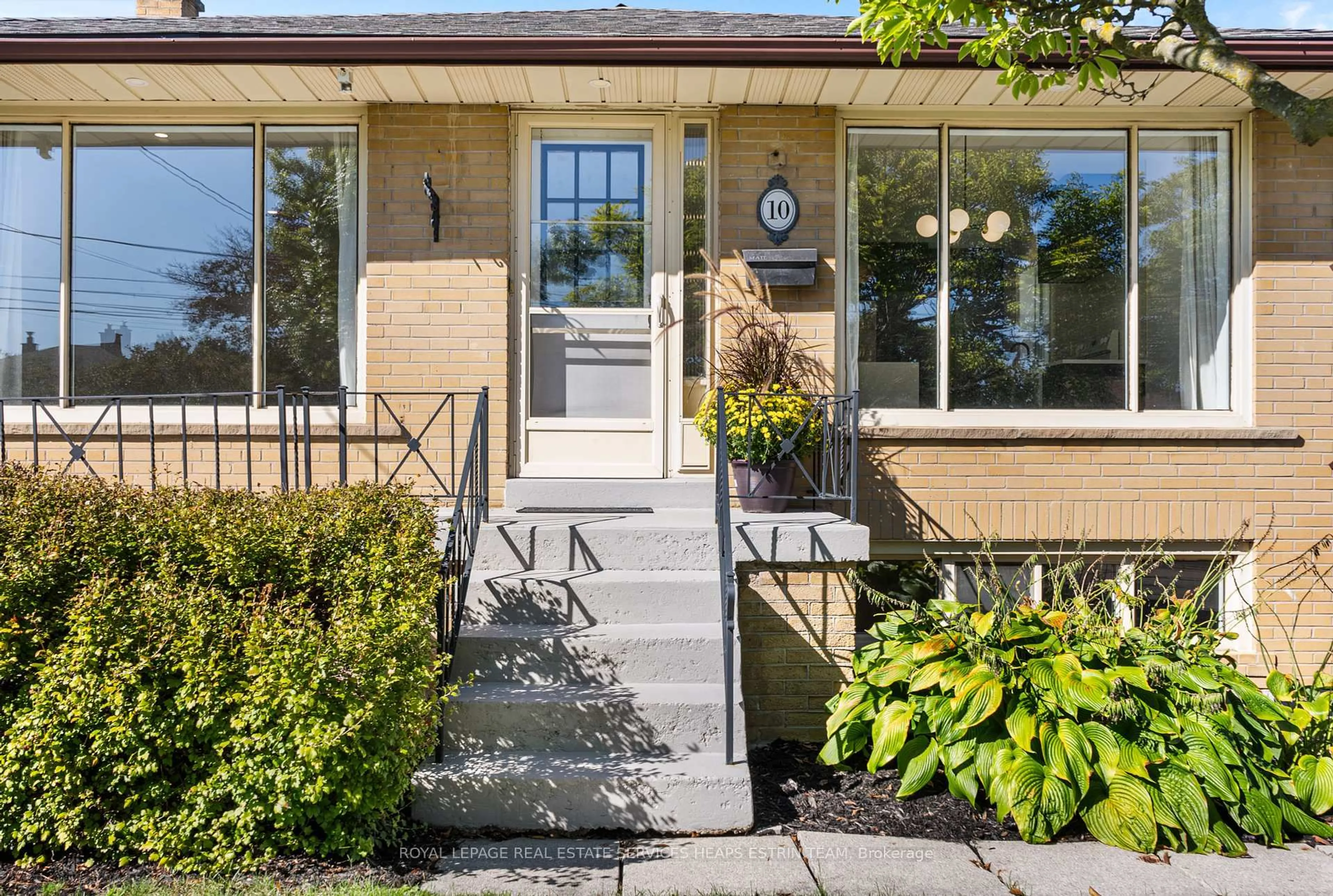 Home with brick exterior material, street for 10 Golfdown Dr, Toronto Ontario M9W 2H5