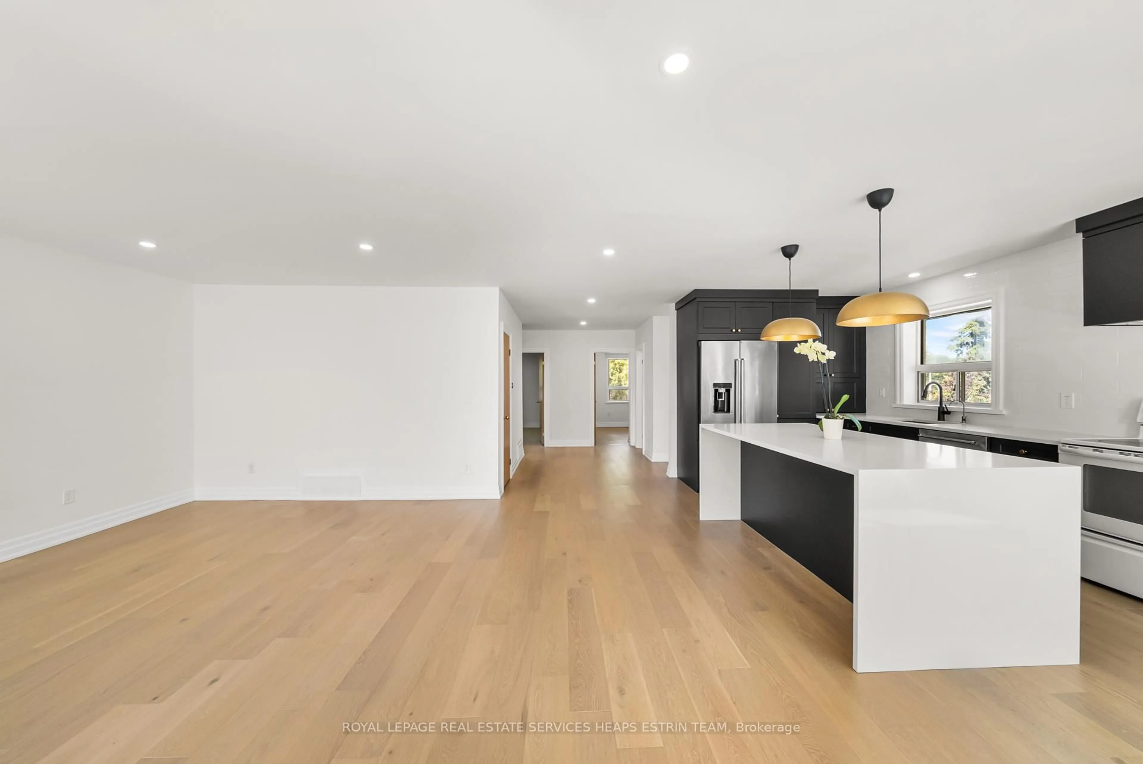 Open concept kitchen, wood/laminate floor for 10 Golfdown Dr, Toronto Ontario M9W 2H5