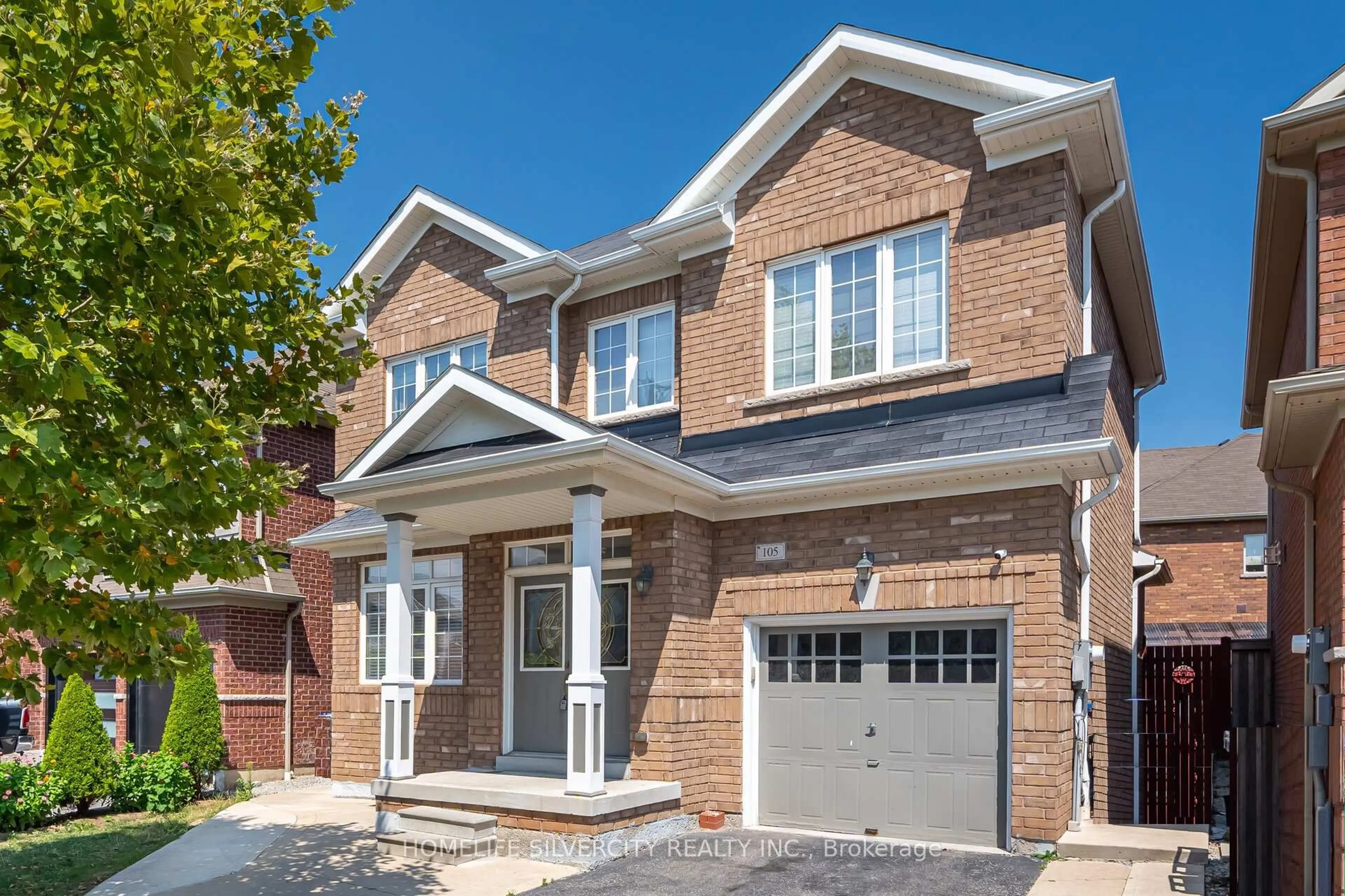 Home with brick exterior material, street for 105 Aylesbury Dr, Brampton Ontario L7A 0W6