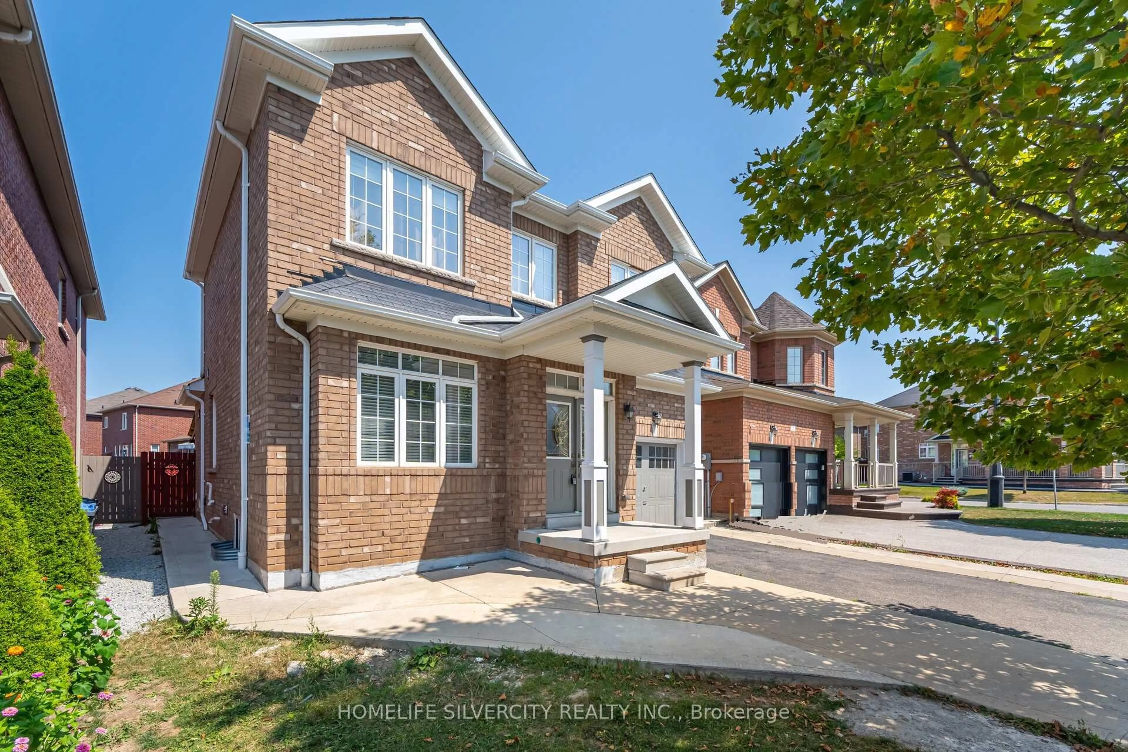 Home with brick exterior material, street for 105 Aylesbury Dr, Brampton Ontario L7A 0W6