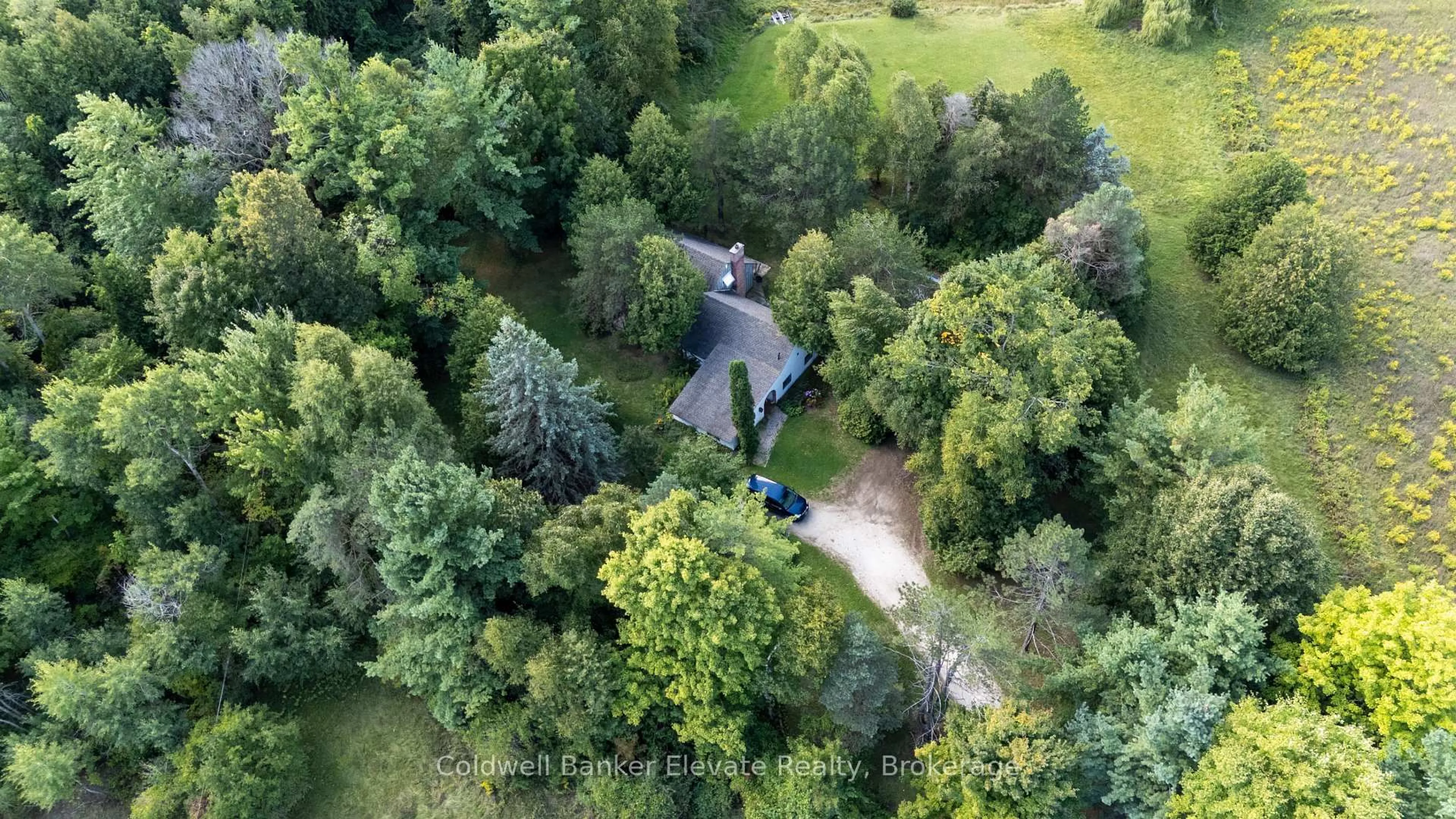 A pic from outside/outdoor area/front of a property/back of a property/a pic from drone, forest/trees view for 13968 9 Line, Halton Hills Ontario L7G 4S8