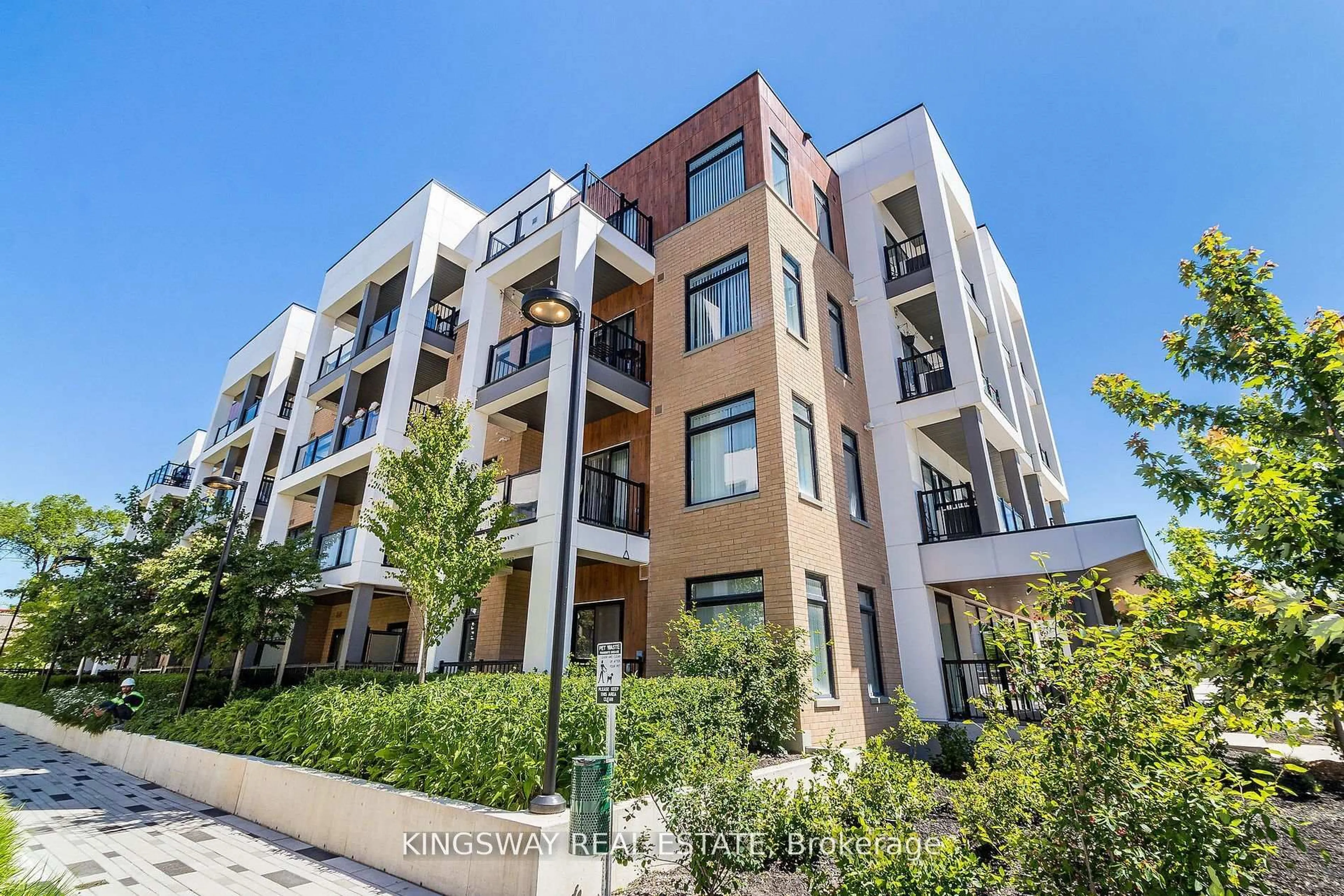 A pic from outside/outdoor area/front of a property/back of a property/a pic from drone, unknown for 120 Canon Jackson Dr #304, Toronto Ontario M6M 0B8