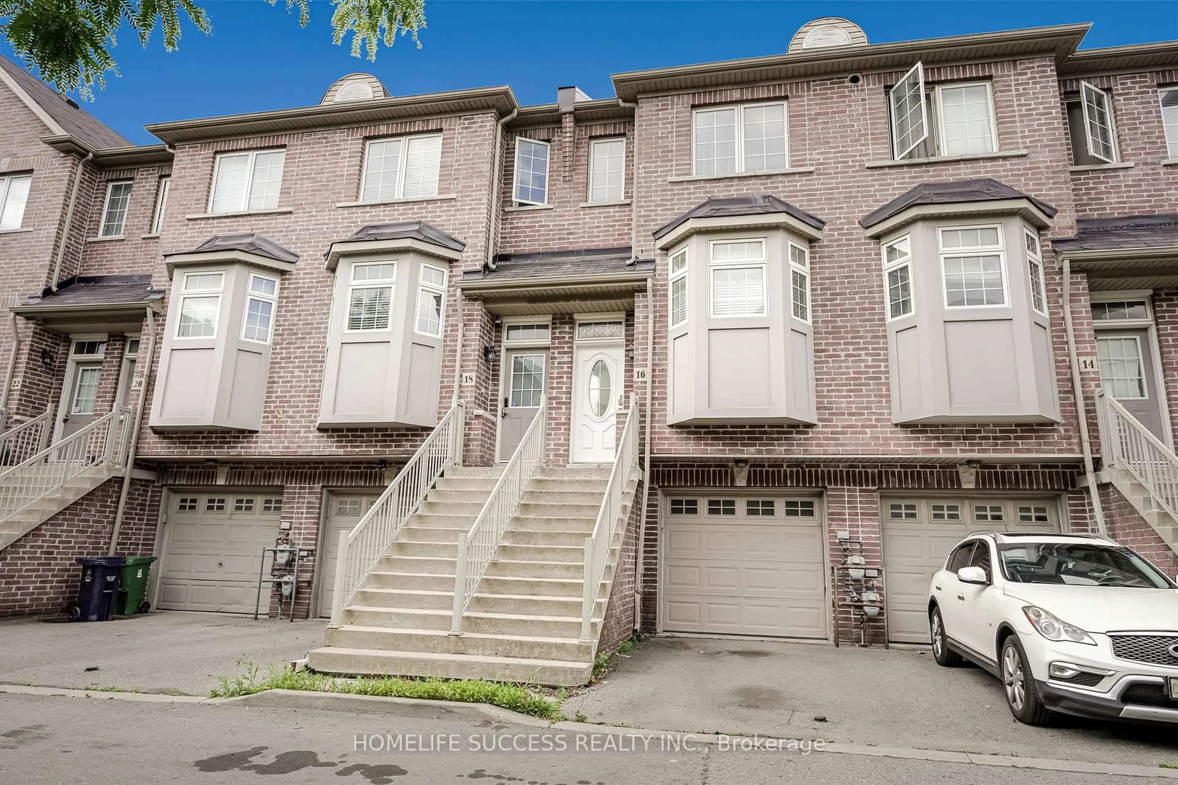 Home with brick exterior material, street for 16 Piggott Mews, Toronto Ontario M9N 0A4