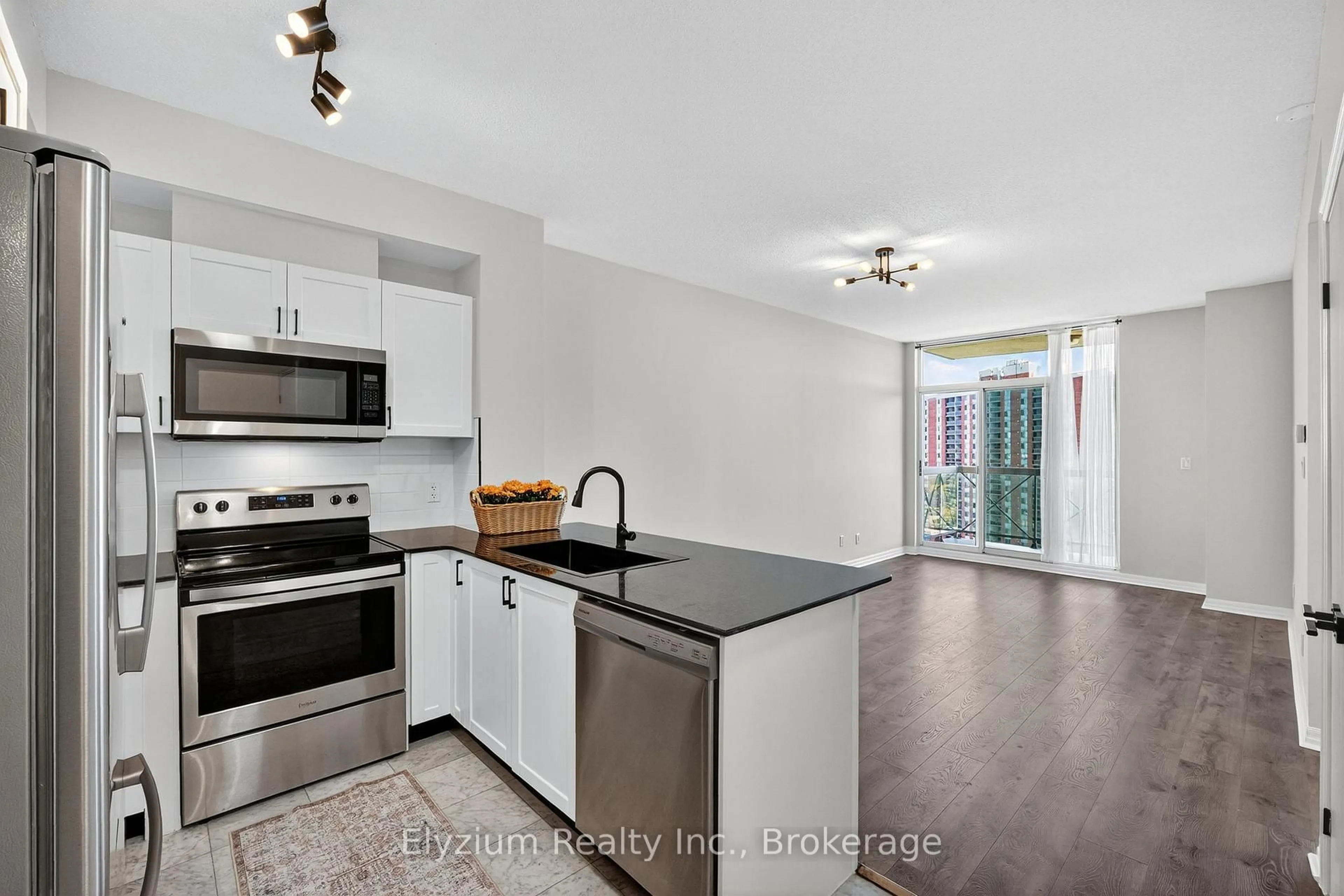 Open concept kitchen, unknown for 1359 Rathburn Rd #1504, Mississauga Ontario L4W 5P7