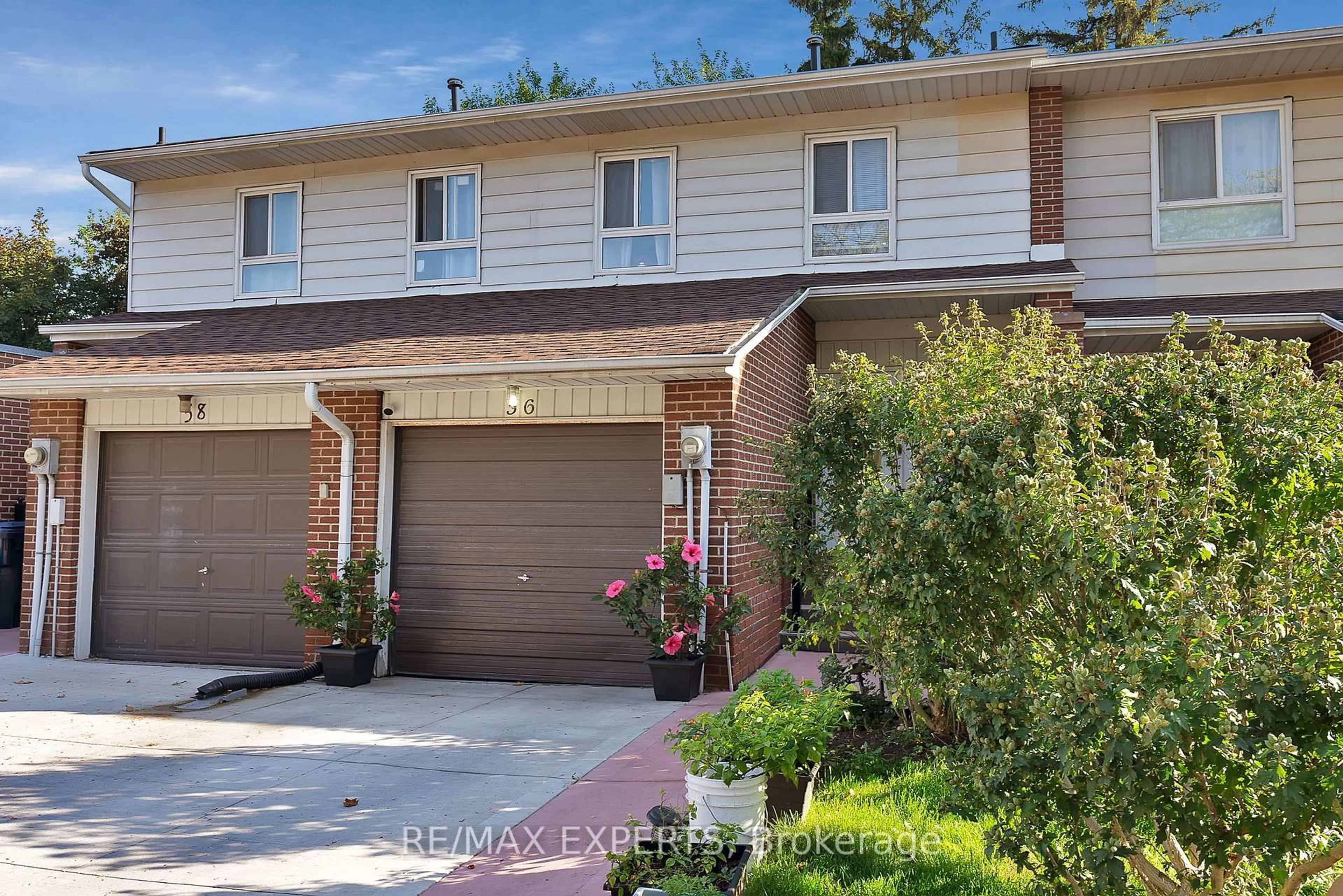 Home with brick exterior material, street for 56 San Marino Way, Toronto Ontario M3N 2Y3