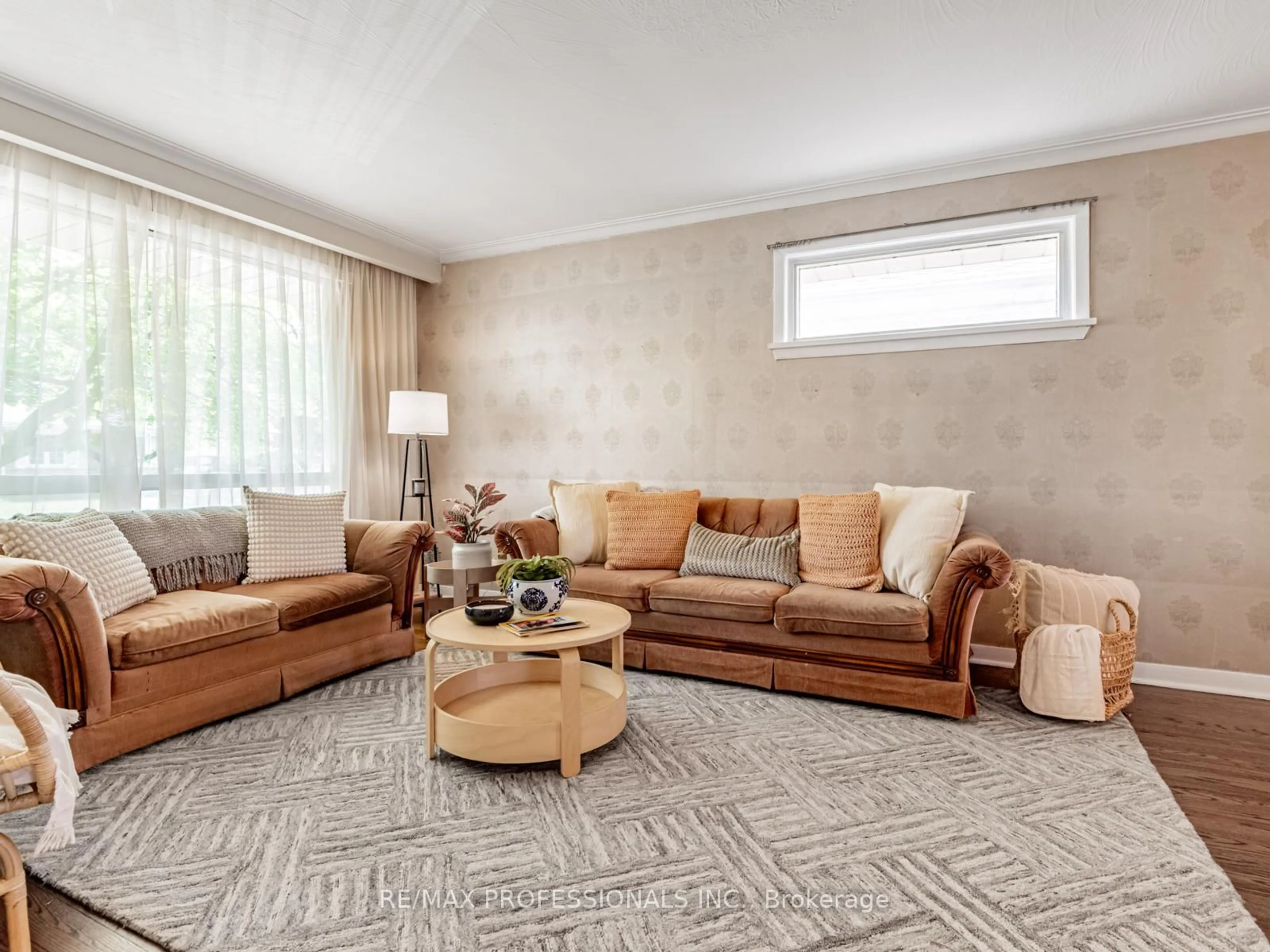 Living room with furniture, carpet floor for 281 Jeffcoat Dr, Toronto Ontario M9W 3E4
