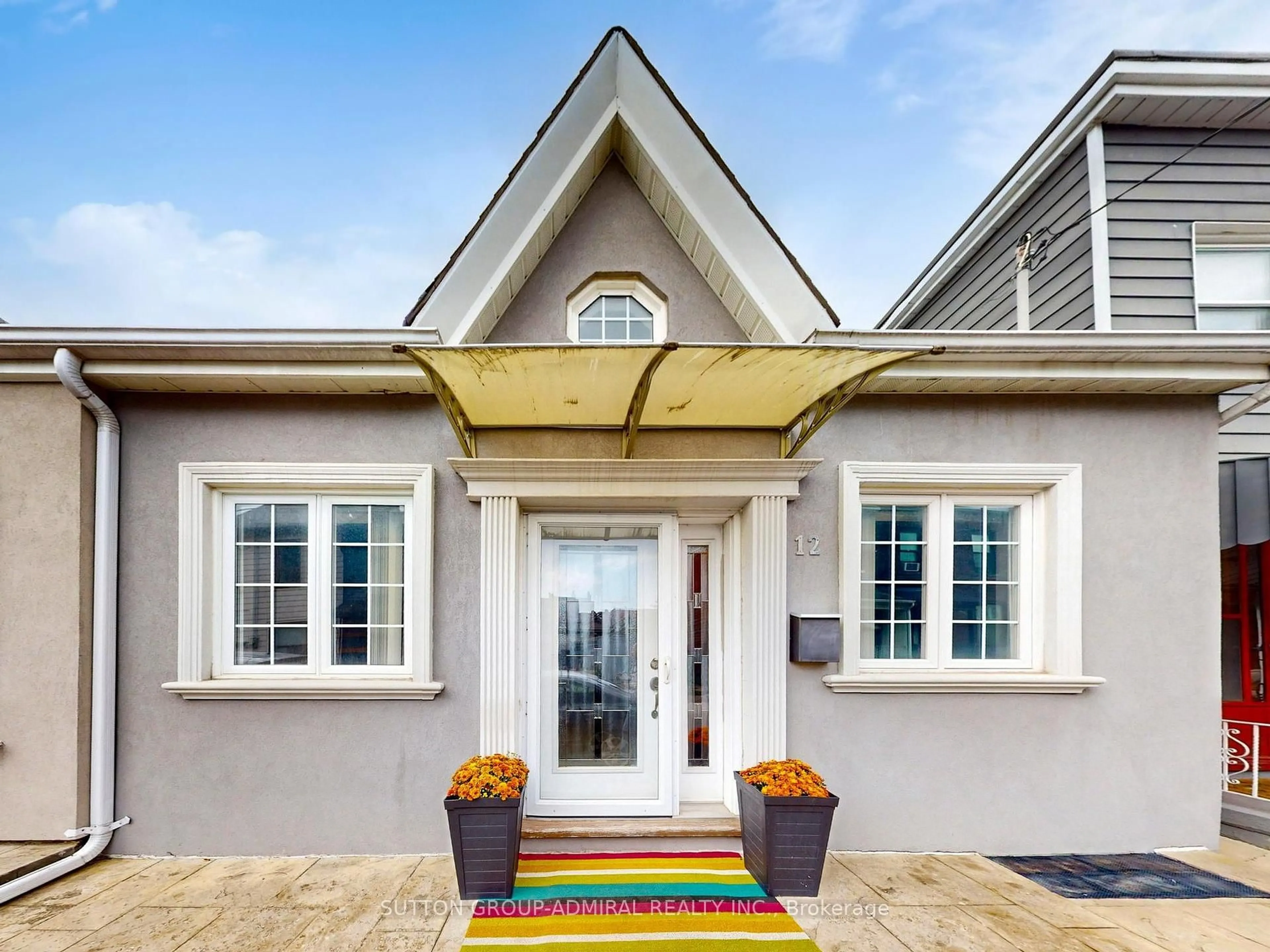 Home with vinyl exterior material, street for 12 Abbs St, Toronto Ontario M6K 1M6
