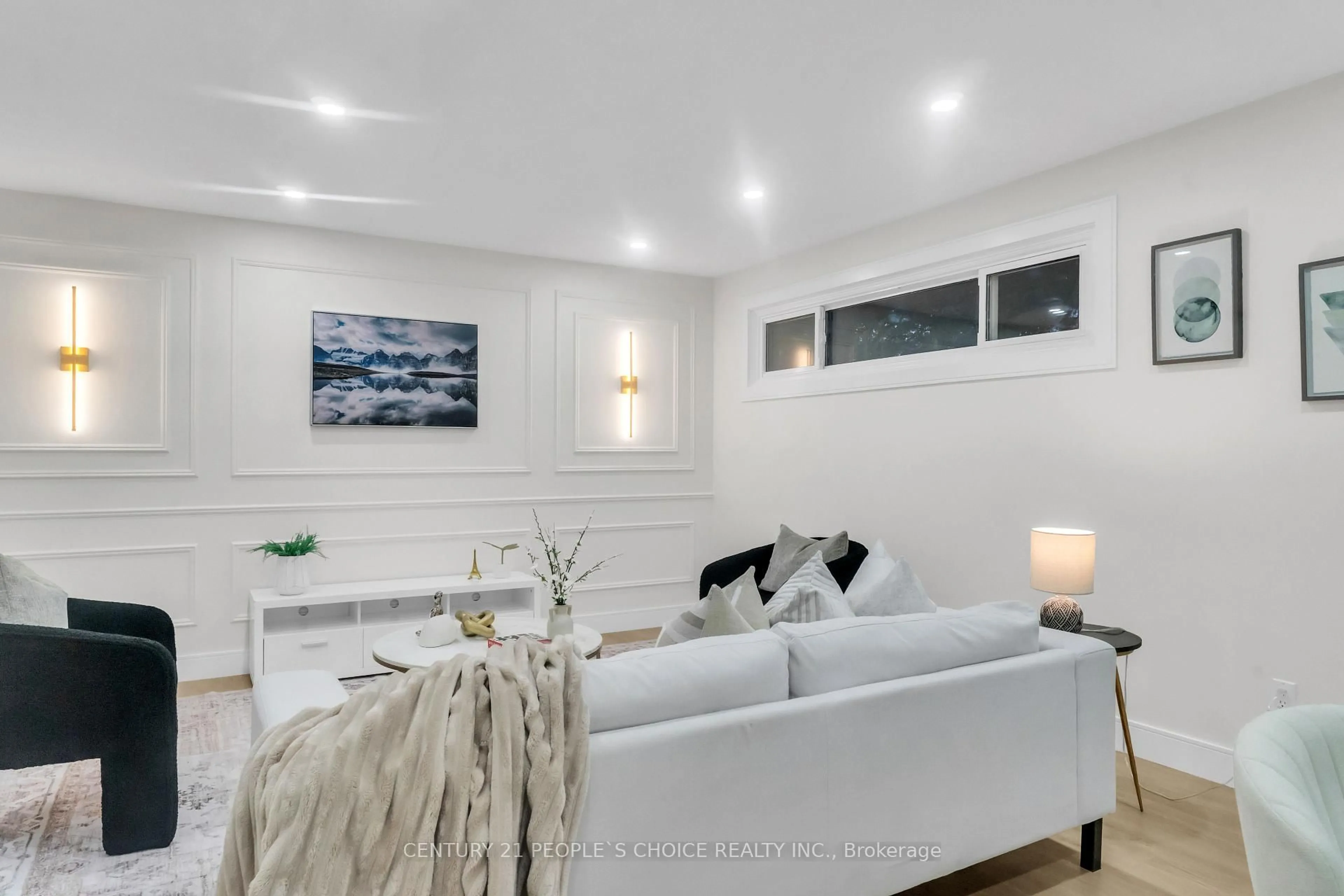 Living room with furniture, wood/laminate floor for 265 Avondale Blvd, Brampton Ontario L6T 1J3