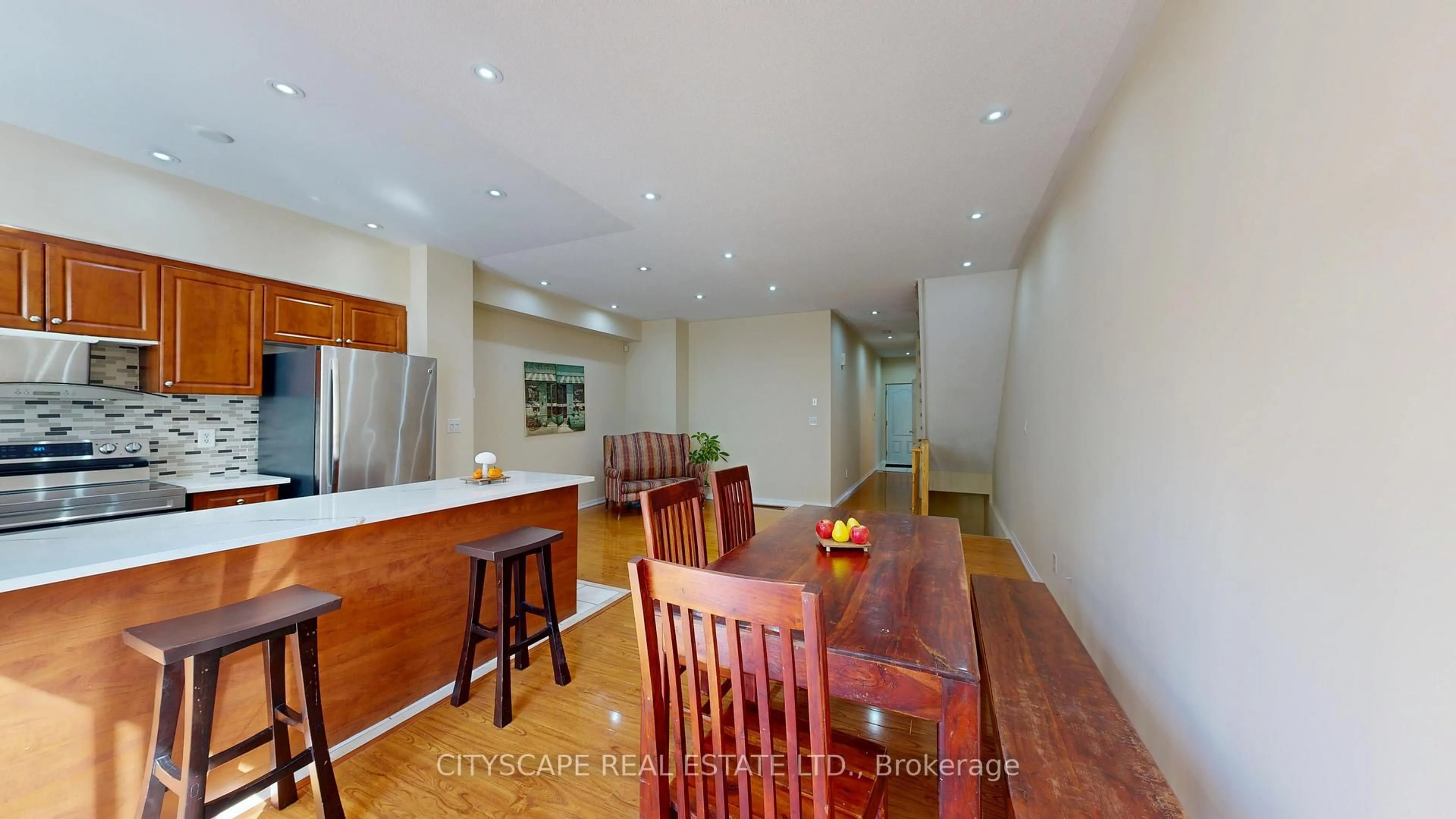 Dining room, wood/laminate floor for 3061 Finch Ave #50, Toronto Ontario M9M 0A7