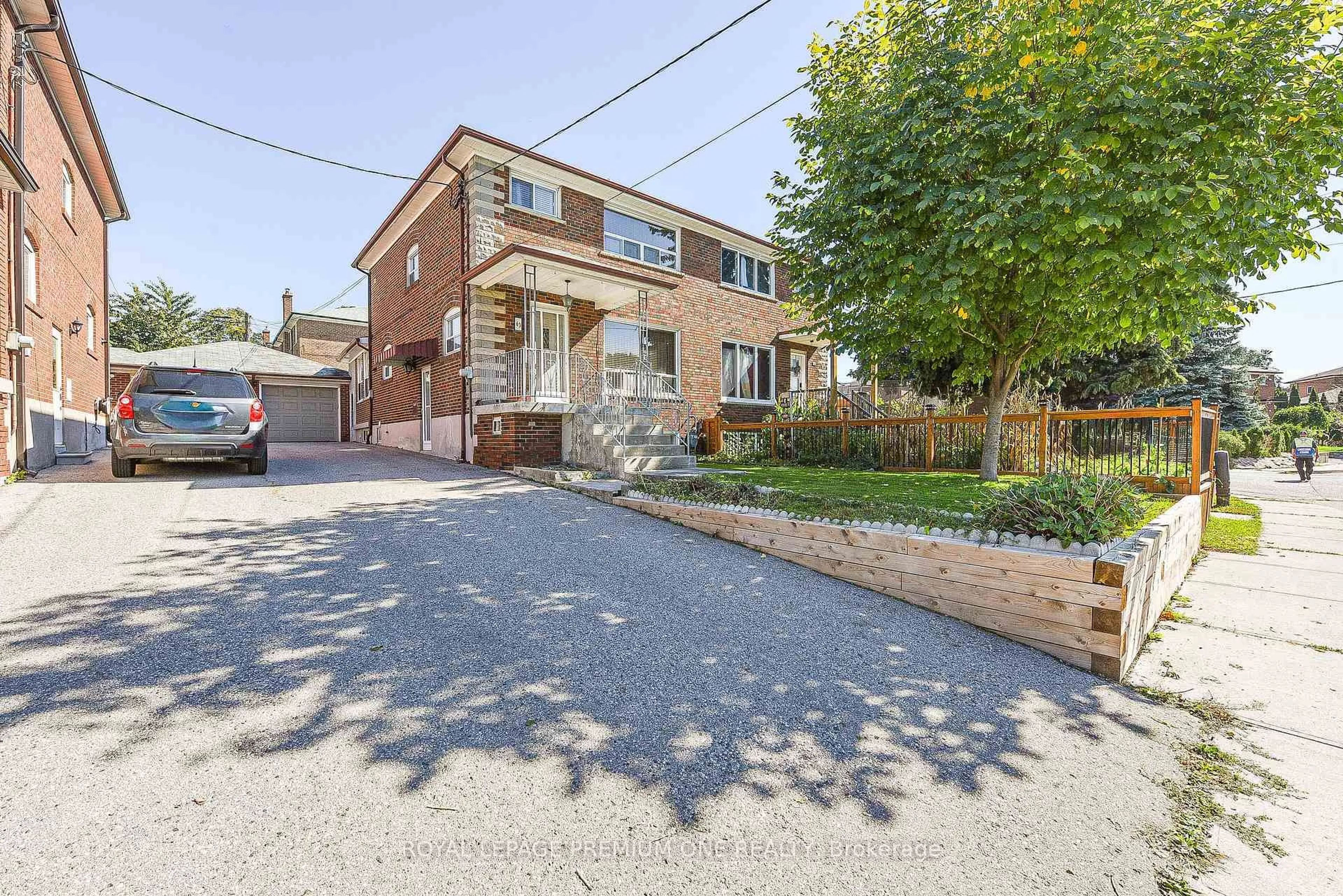 Home with brick exterior material, street for 63 Haverson Blvd, Toronto Ontario M6M 3J8