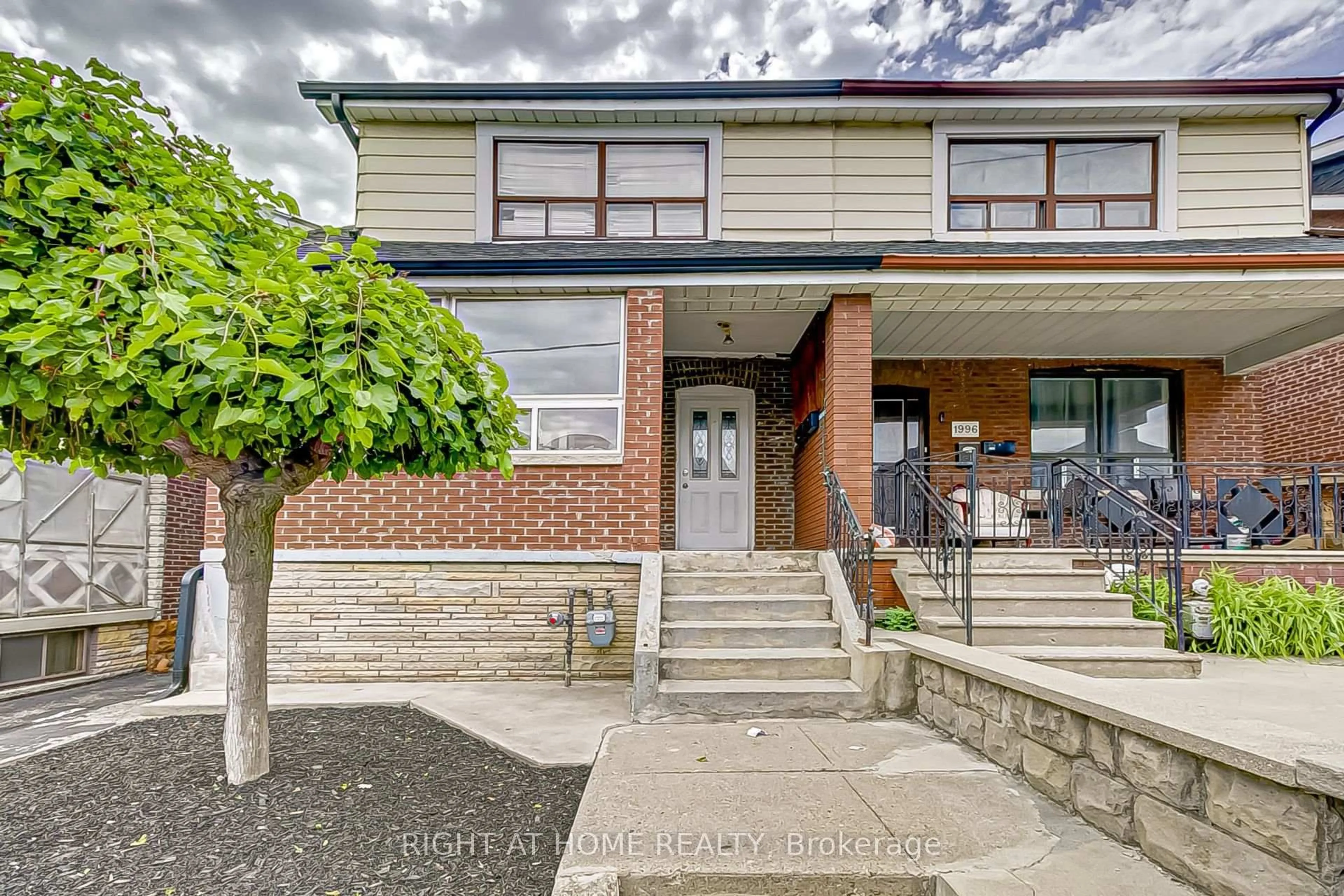 Home with brick exterior material, street for 1994 Dufferin St, Toronto Ontario M6E 3R2