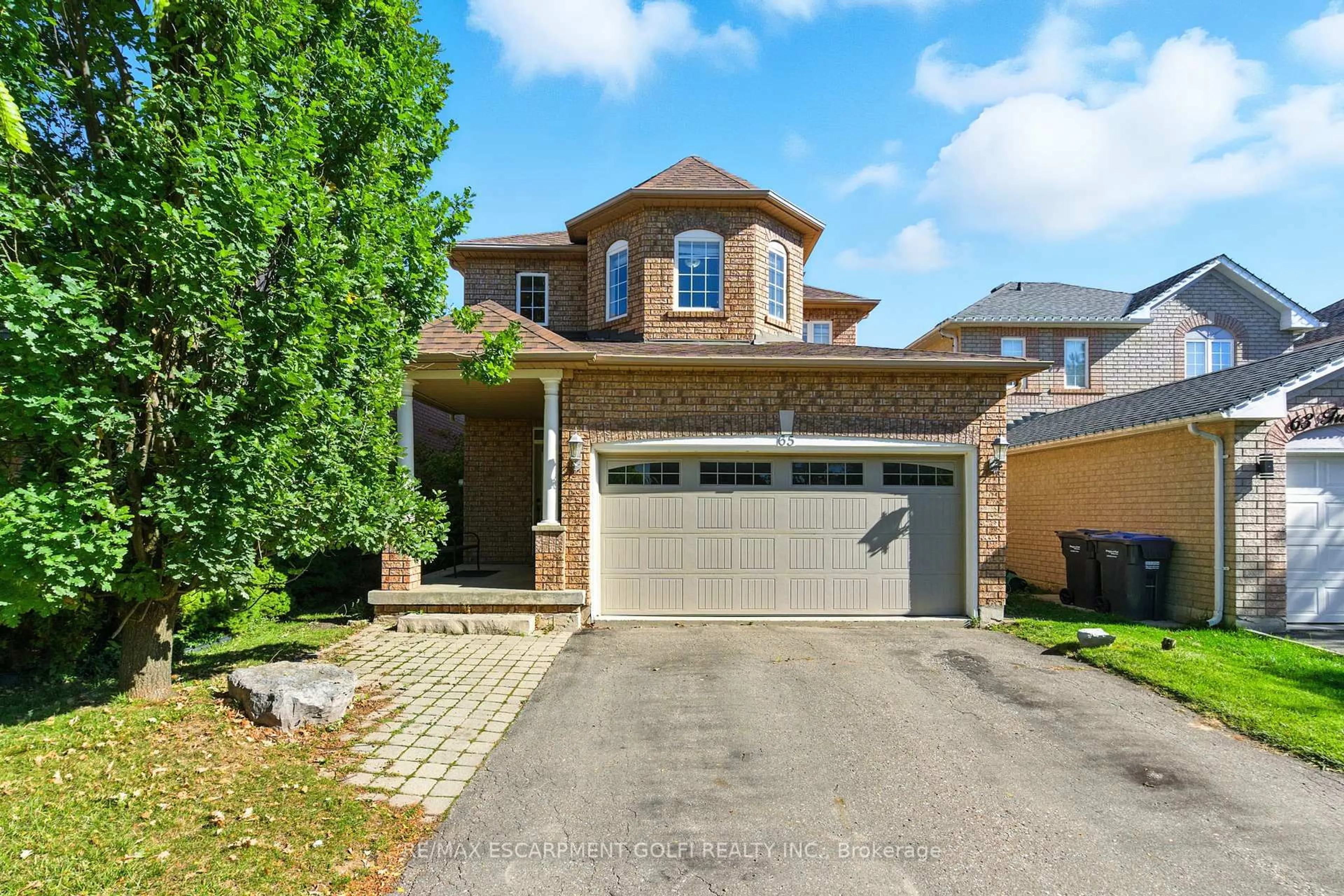 Home with brick exterior material, street for 65 Twin Willow Cres, Brampton Ontario L7A 1K2