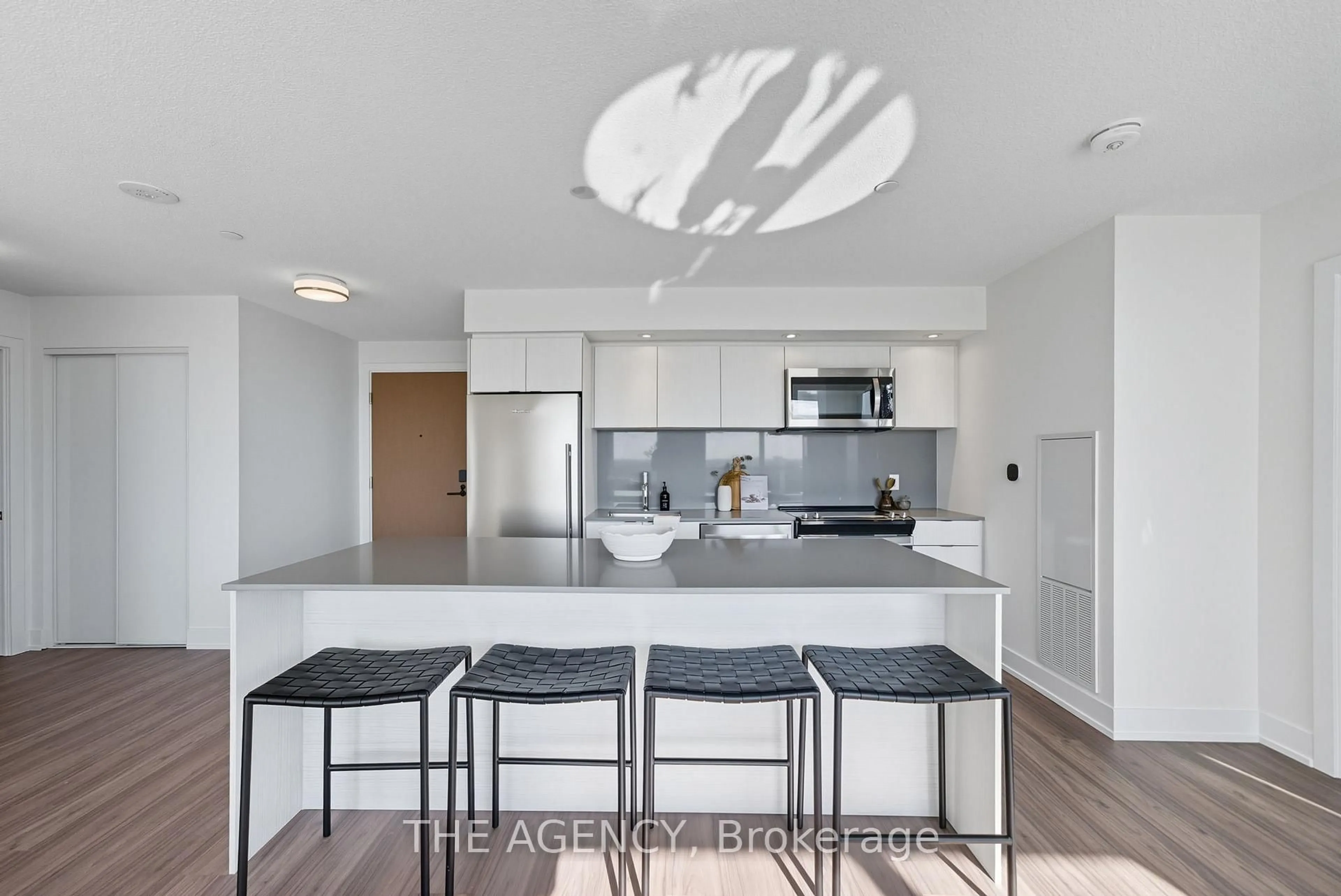 Open concept kitchen, ceramic/tile floor for 10 Eva Rd #2402, Toronto Ontario M9C 0B3