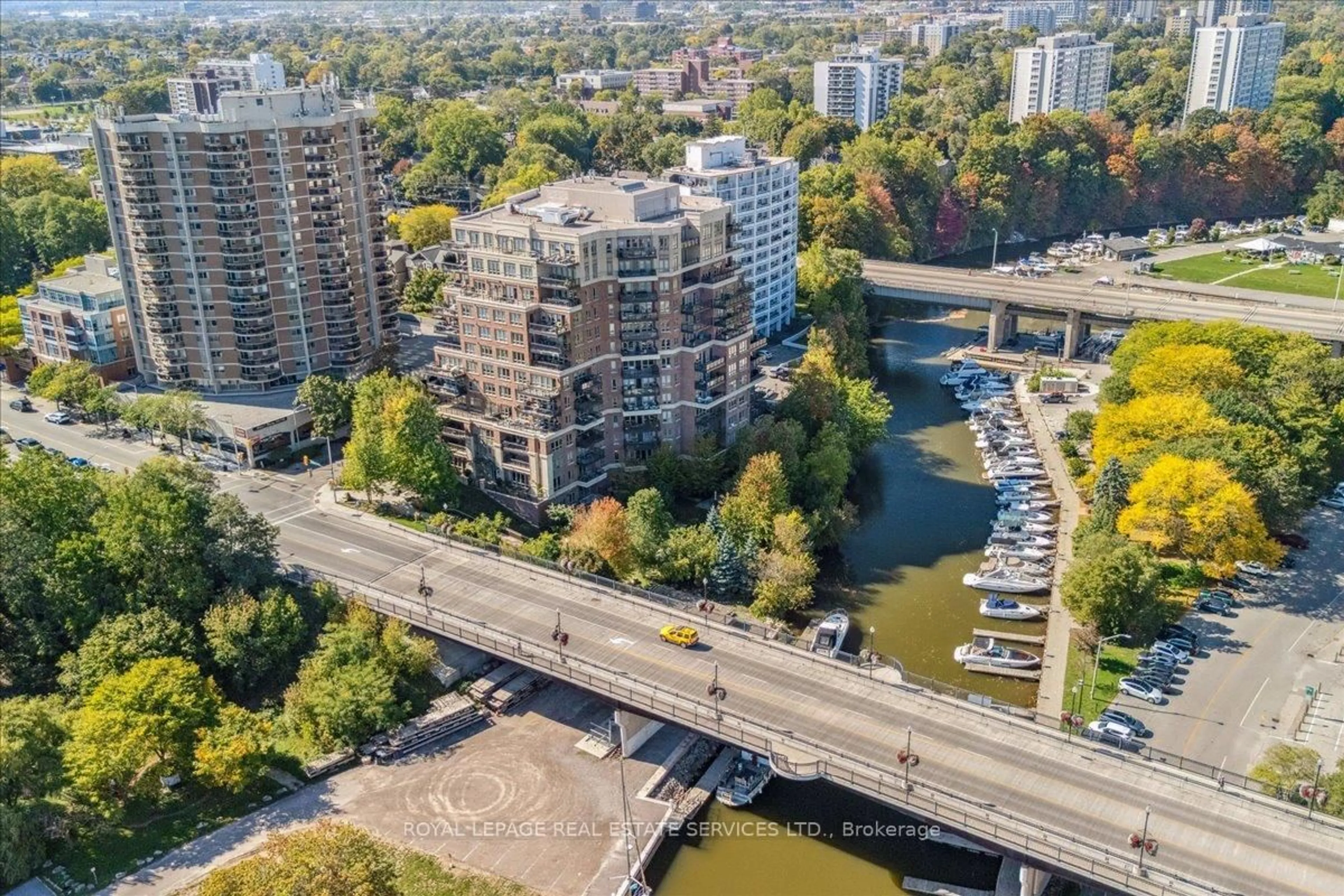 A pic from outside/outdoor area/front of a property/back of a property/a pic from drone, city buildings view from balcony for 111 Forsythe St #401, Oakville Ontario L6K 3J9
