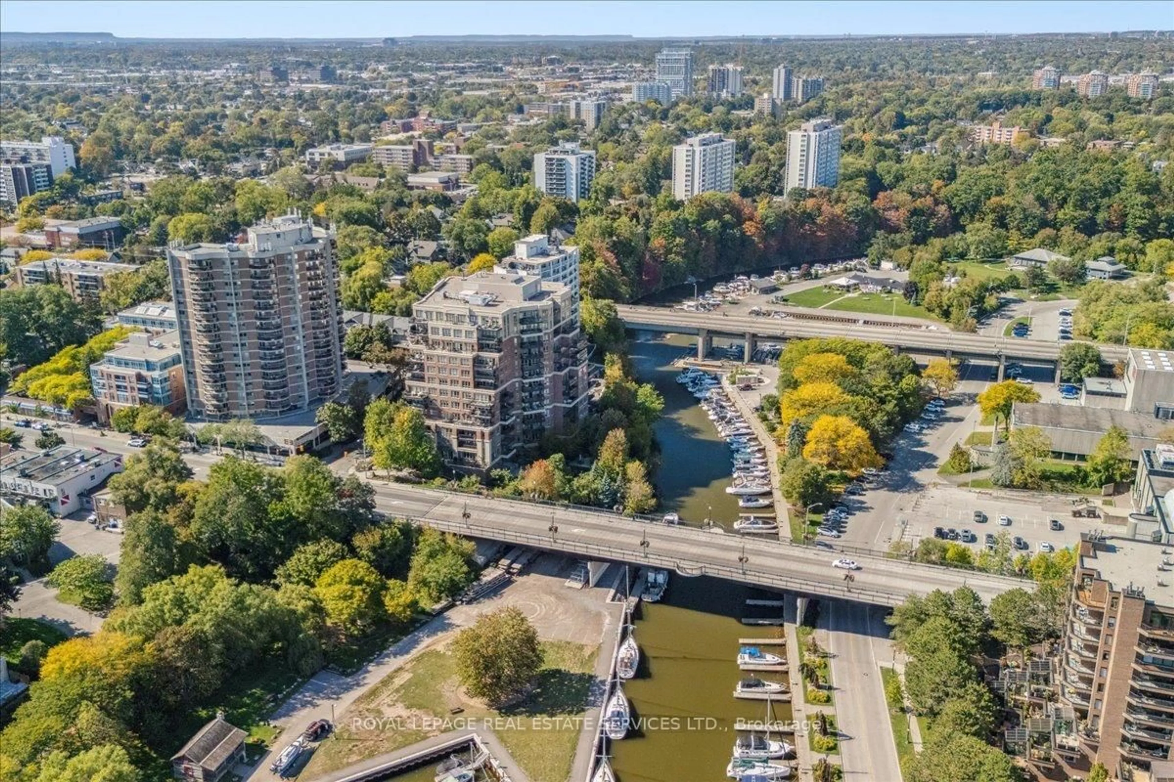 A pic from outside/outdoor area/front of a property/back of a property/a pic from drone, city buildings view from balcony for 111 Forsythe St #401, Oakville Ontario L6K 3J9