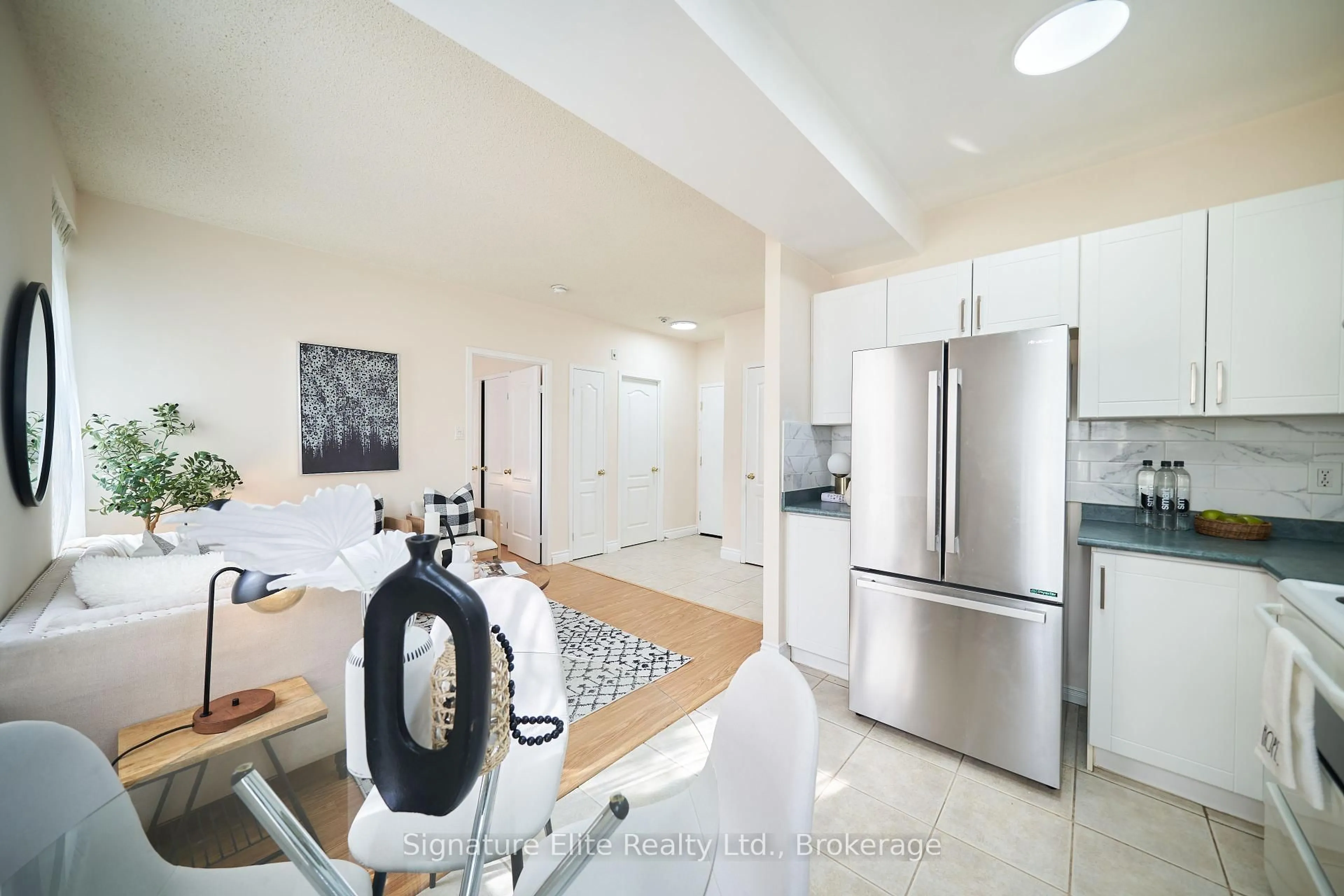 Open concept kitchen, ceramic/tile floor for 2874 Keele St #205, Toronto Ontario M3M 3C4