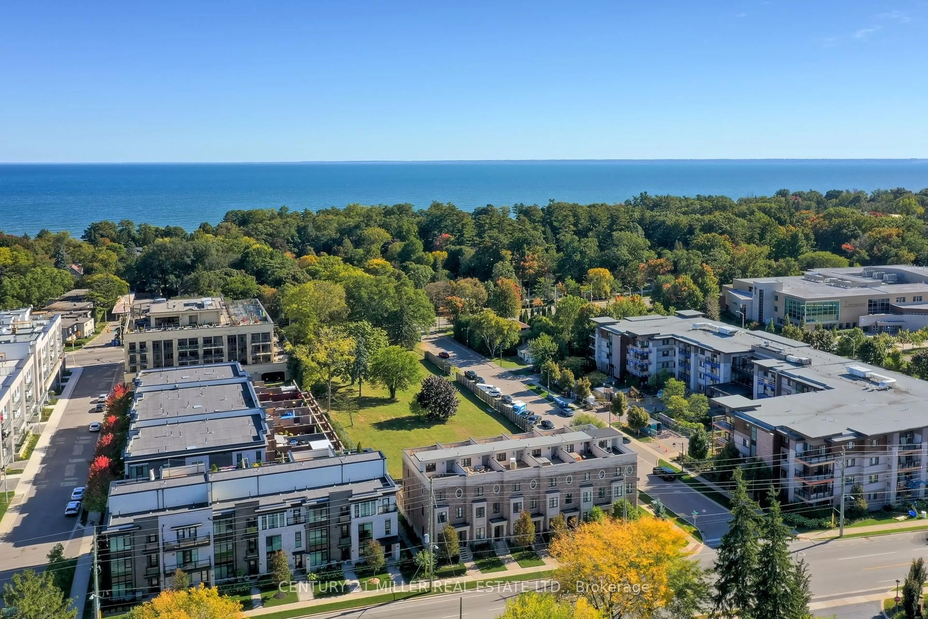 A pic from outside/outdoor area/front of a property/back of a property/a pic from drone, water/lake/river/ocean view for 216 Rebecca St, Oakville Ontario L6K 1J9