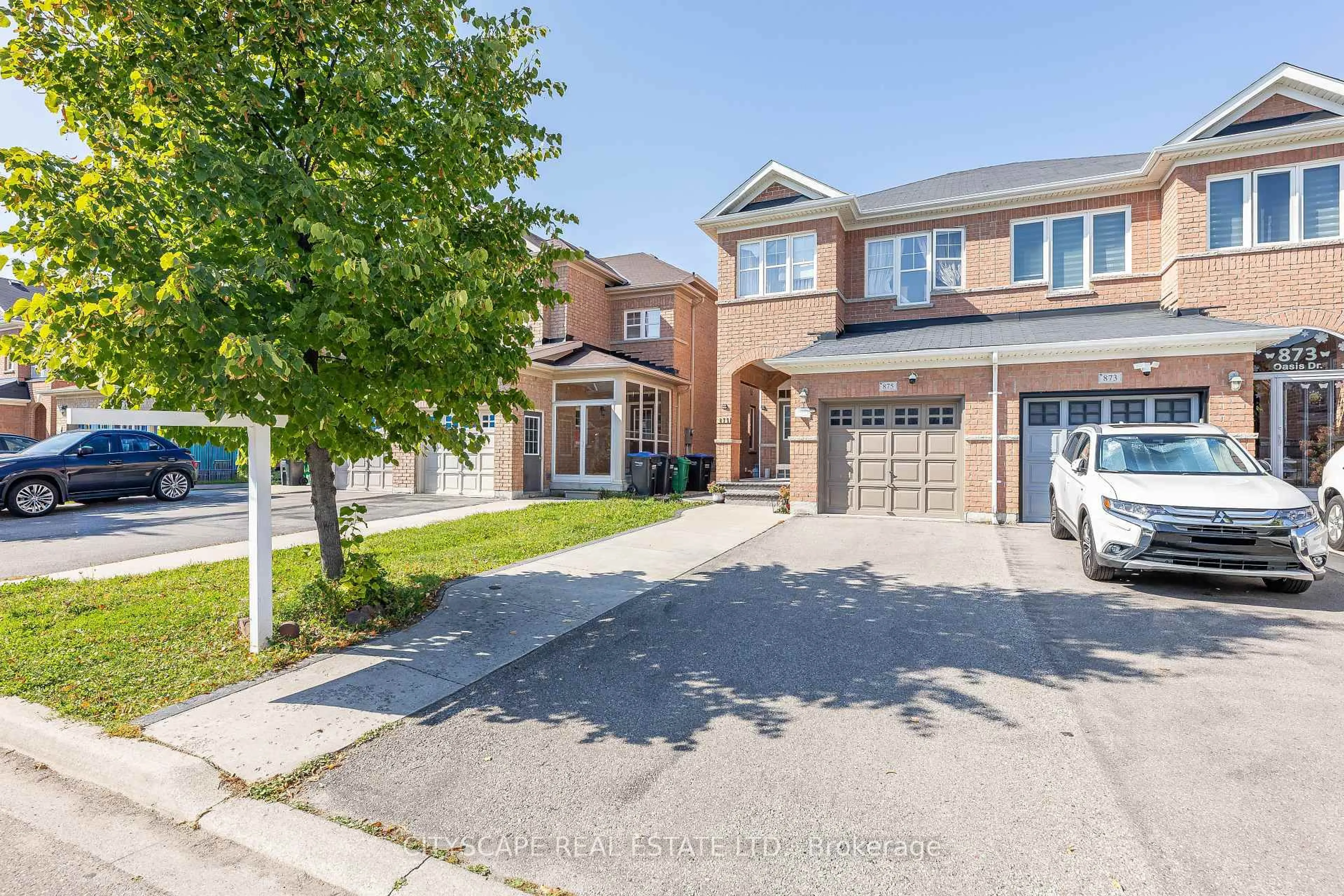 Home with brick exterior material, street for 875 Oasis Dr, Mississauga Ontario L5V 0C6