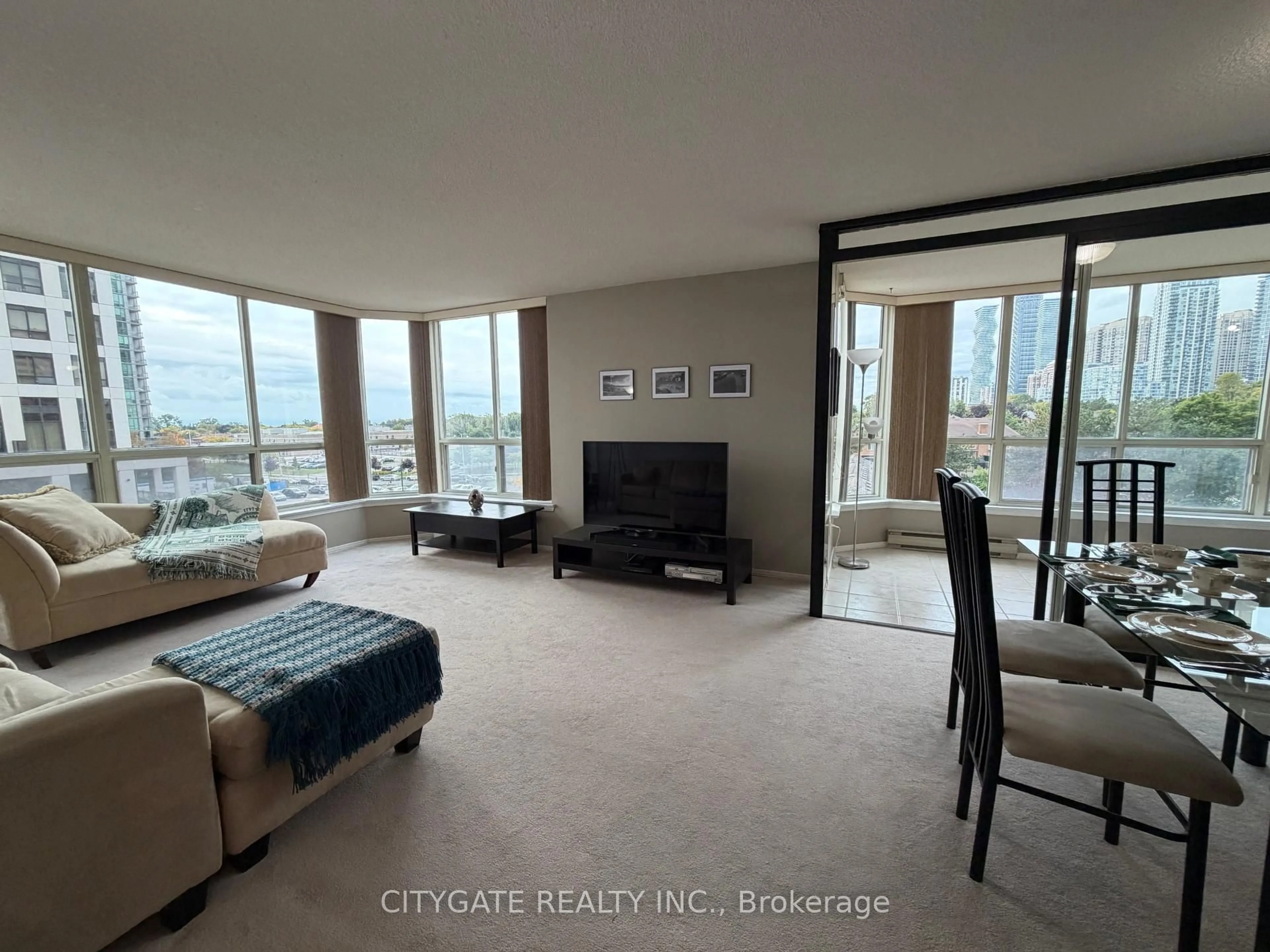 Living room with furniture, unknown for 55 Elm Dr #612, Mississauga Ontario L5B 3Z3