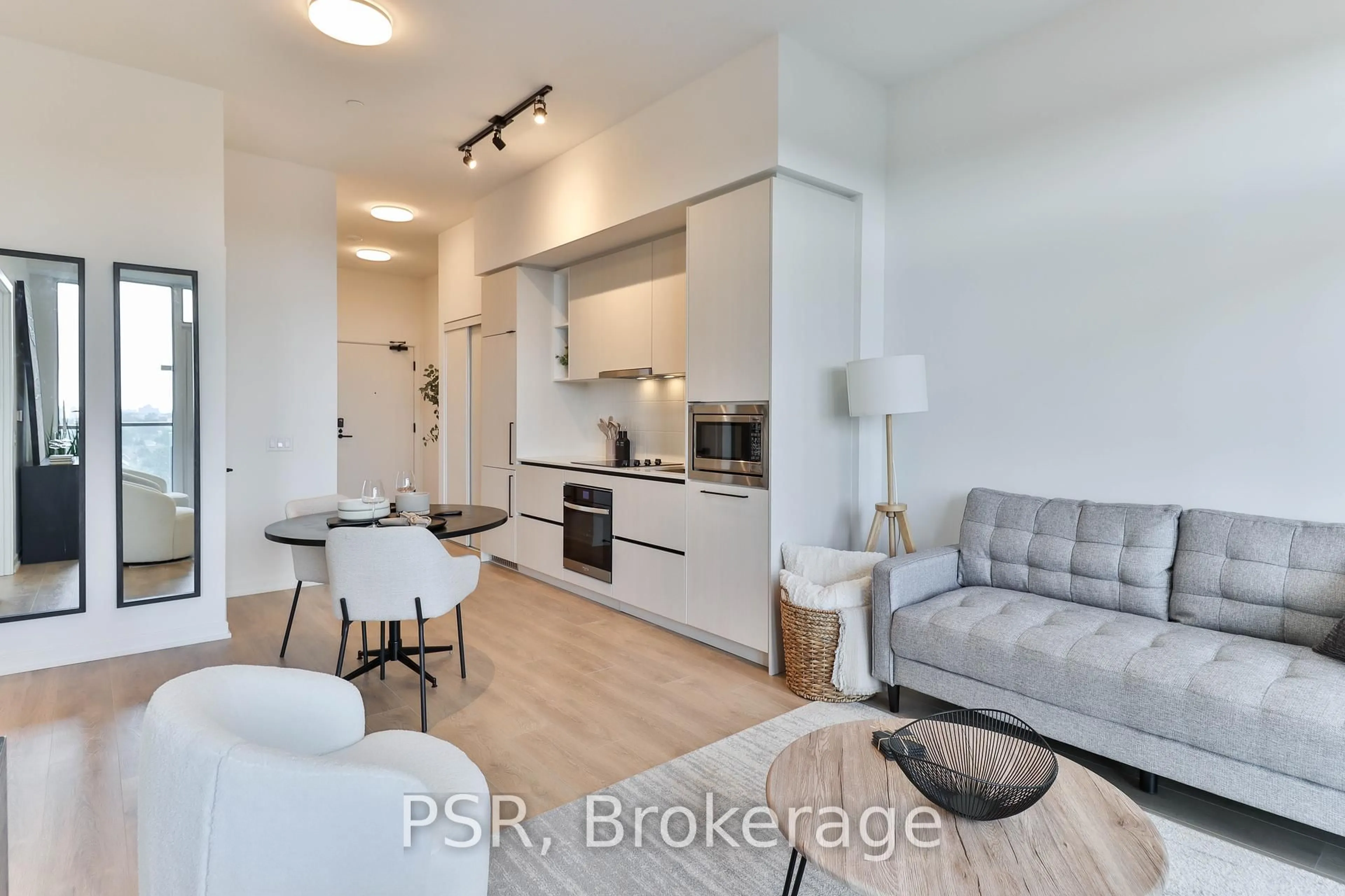 Open concept kitchen, wood/laminate floor for 1285 Dupont St #702, Toronto Ontario M6H 2A6