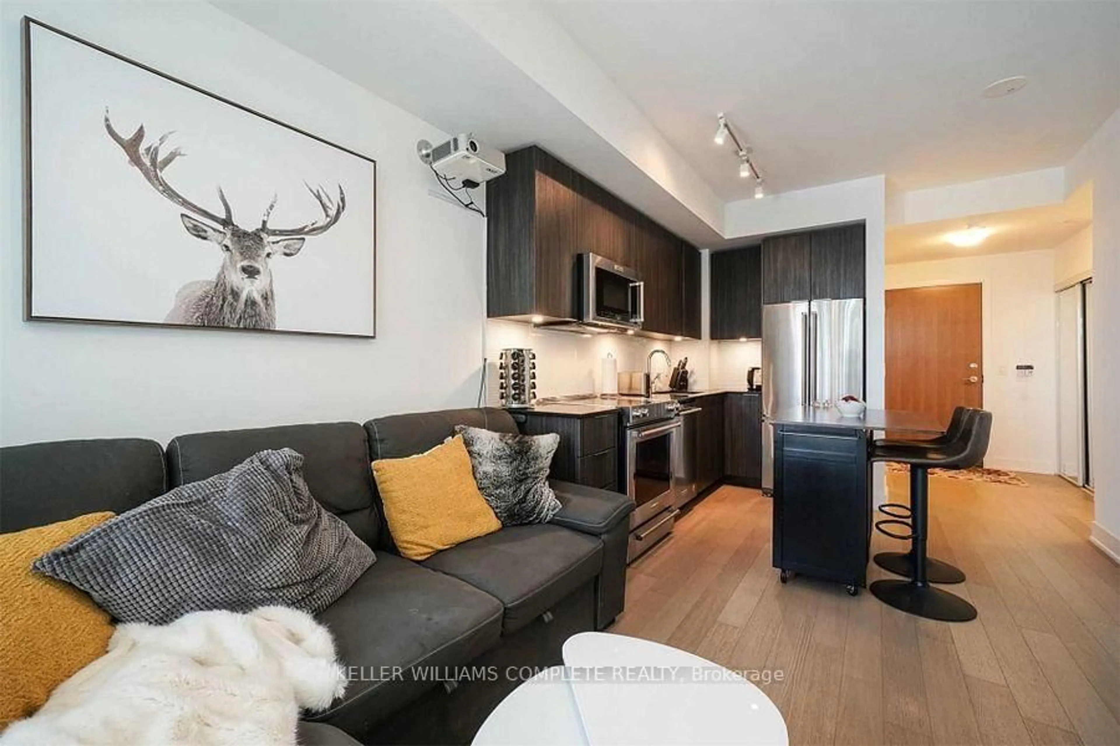 Open concept kitchen, wood/laminate floor for 20 Shore Breeze Dr #3103, Toronto Ontario M8V 0C7