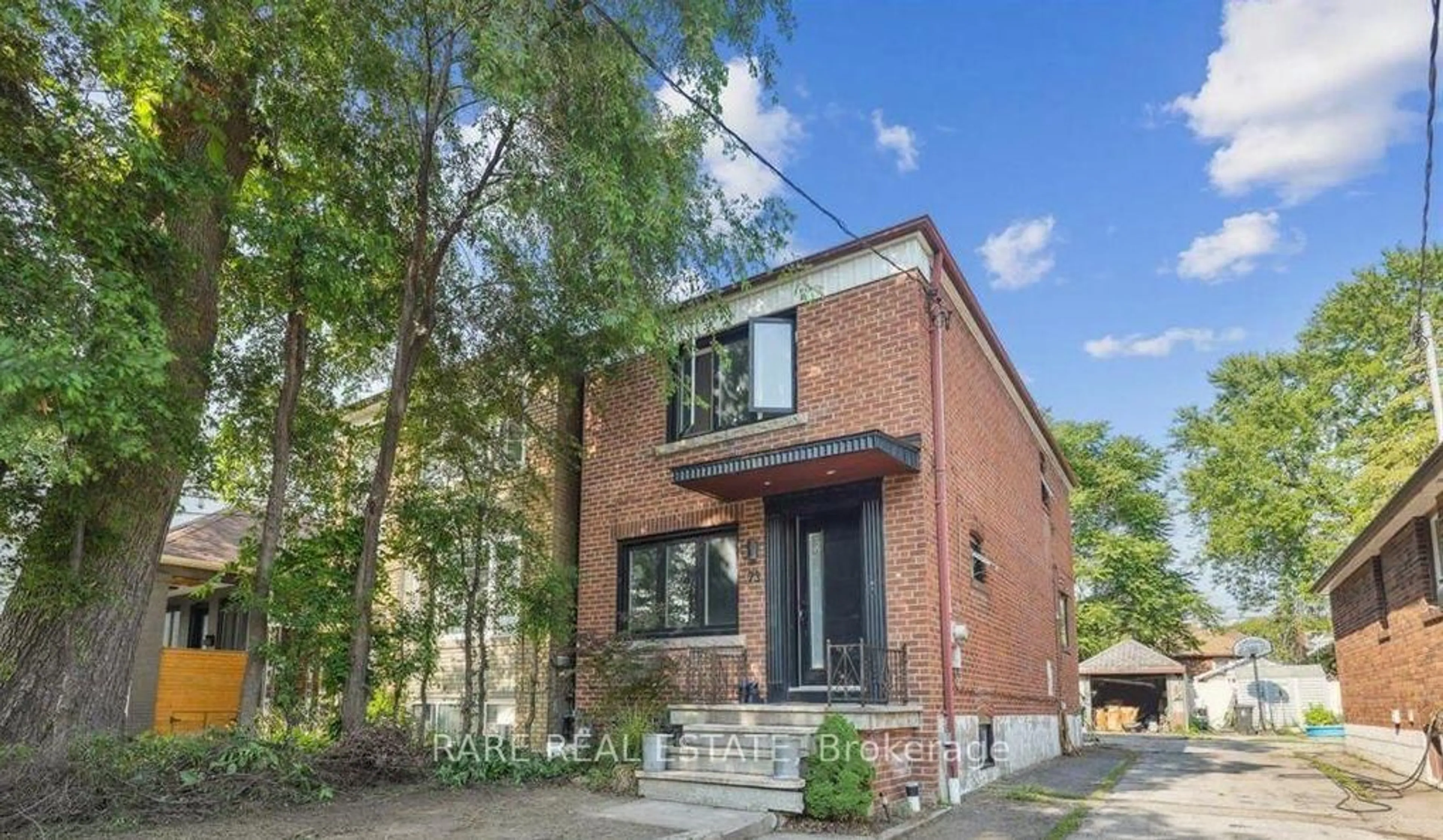 Home with brick exterior material, street for 73 Yarrow Rd, Toronto Ontario M6M 4E4
