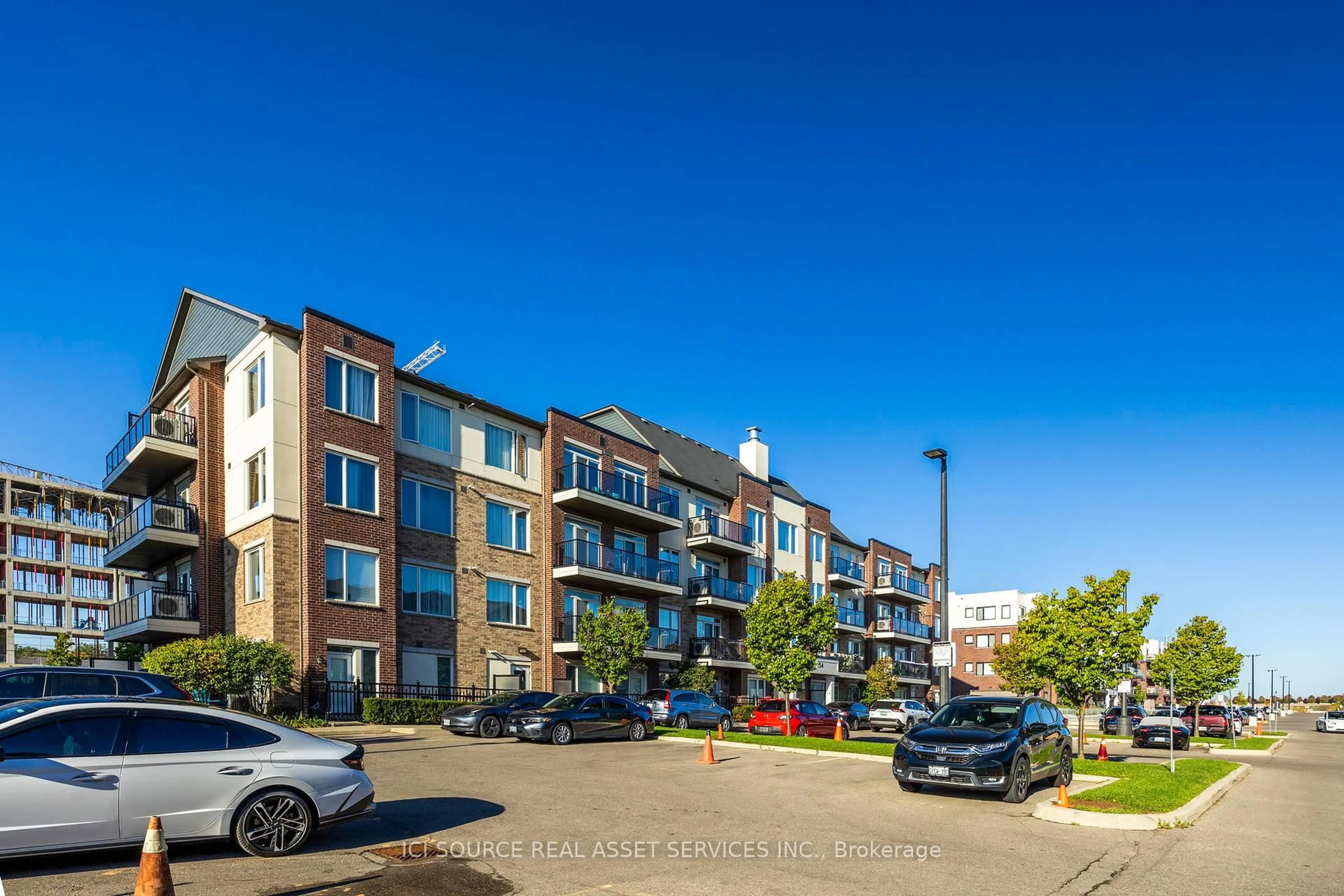 A pic from outside/outdoor area/front of a property/back of a property/a pic from drone, street for 54 Sky Harbour Dr #110, Brampton Ontario L7A 0A1