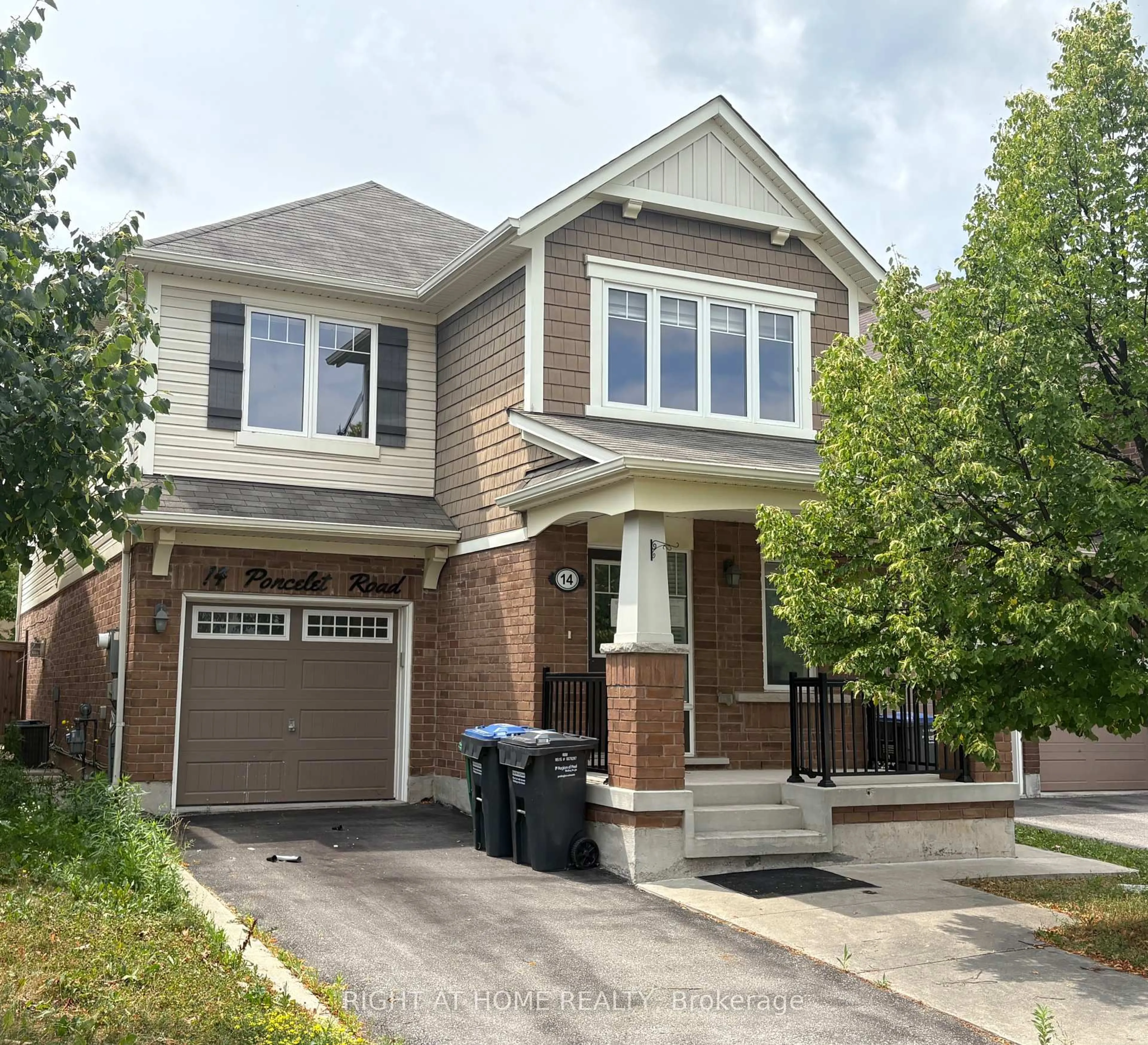 Home with brick exterior material, street for 14 Poncelet Rd, Brampton Ontario L7A 0V5