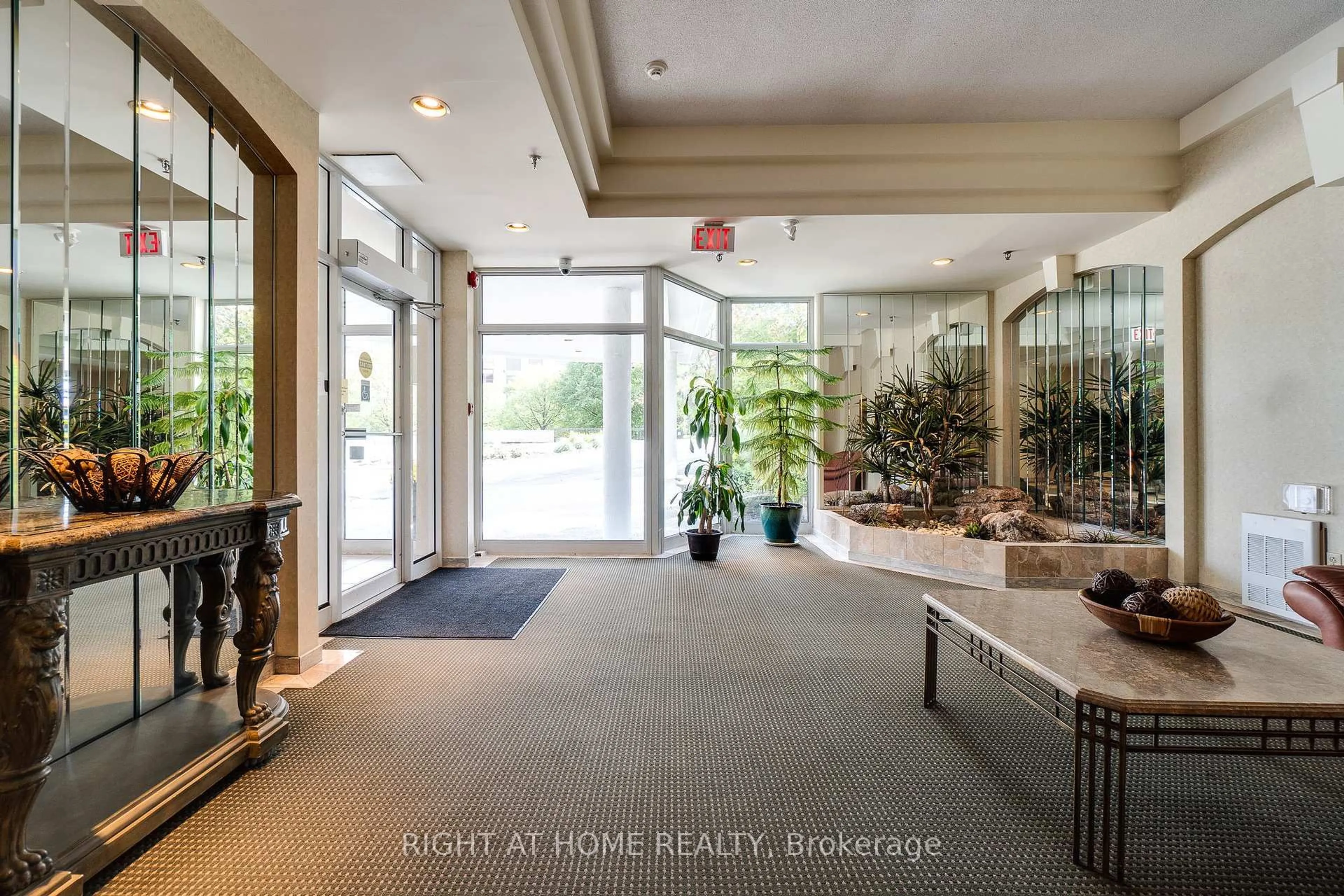 Indoor foyer for 1071 Queens Ave #202, Oakville Ontario L6H 2R5
