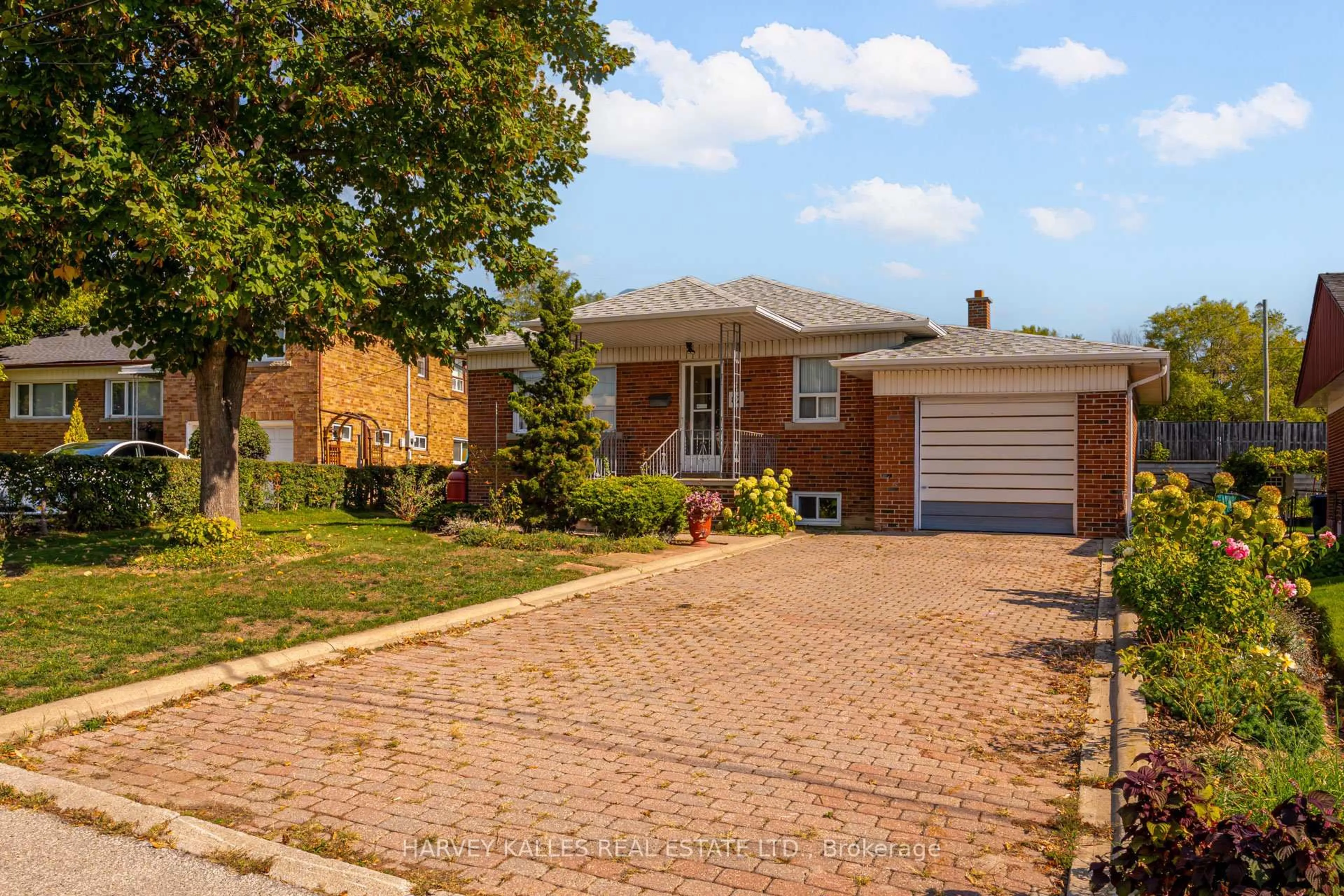 Home with brick exterior material, street for 82 Cork Ave, Toronto Ontario M6B 2Y2