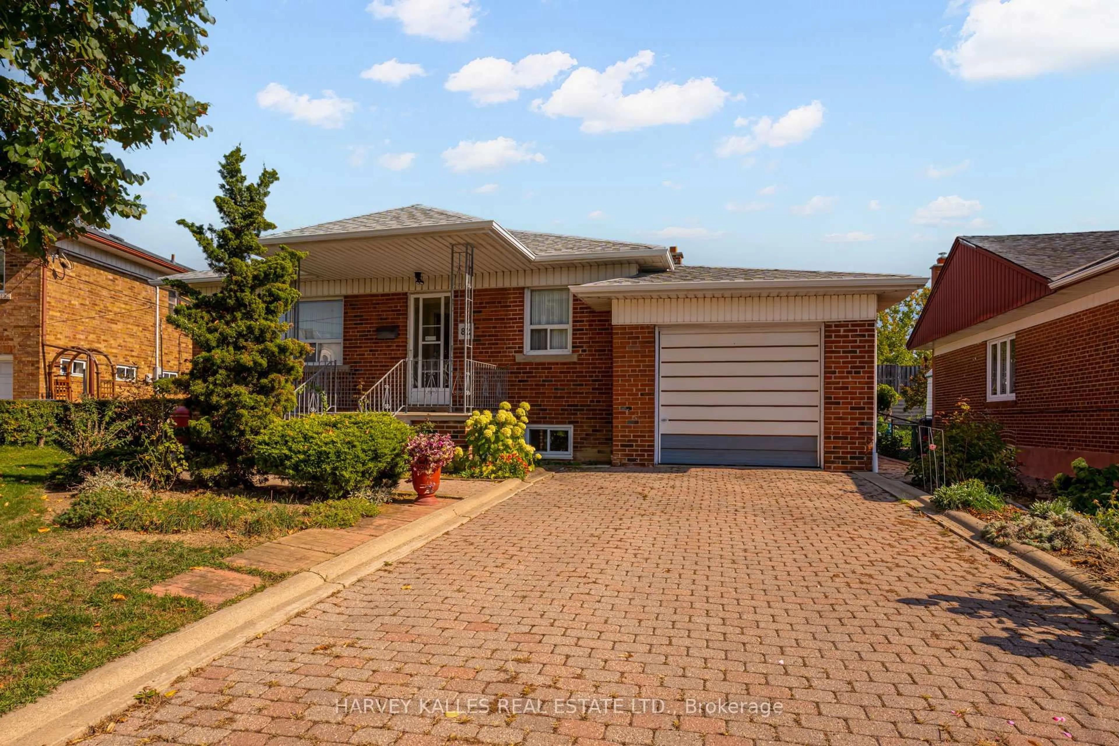 Home with brick exterior material, street for 82 Cork Ave, Toronto Ontario M6B 2Y2