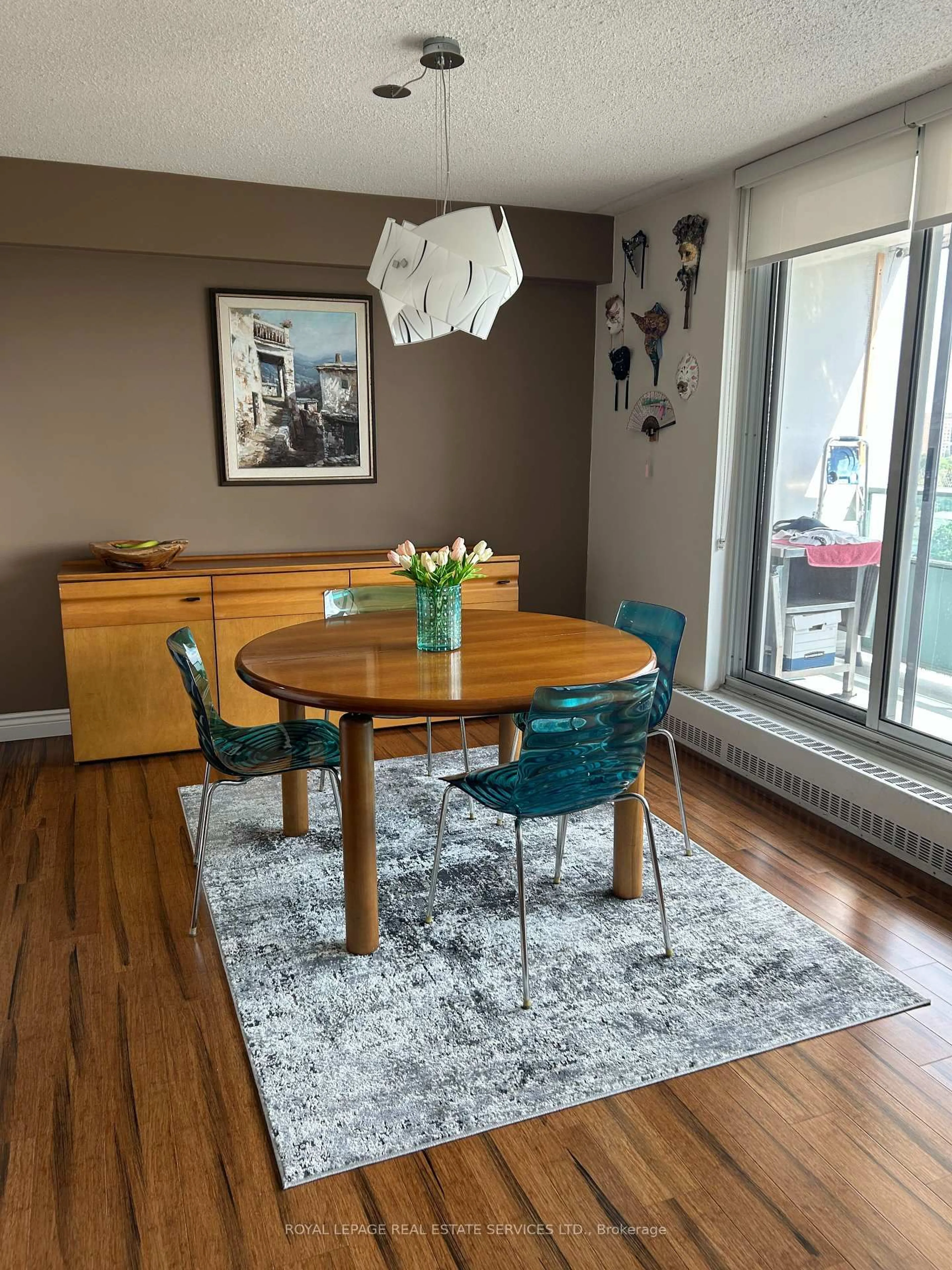 Dining room, wood/laminate floor for 44 Longbourne Dr #1008, Toronto Ontario M9R 2M7