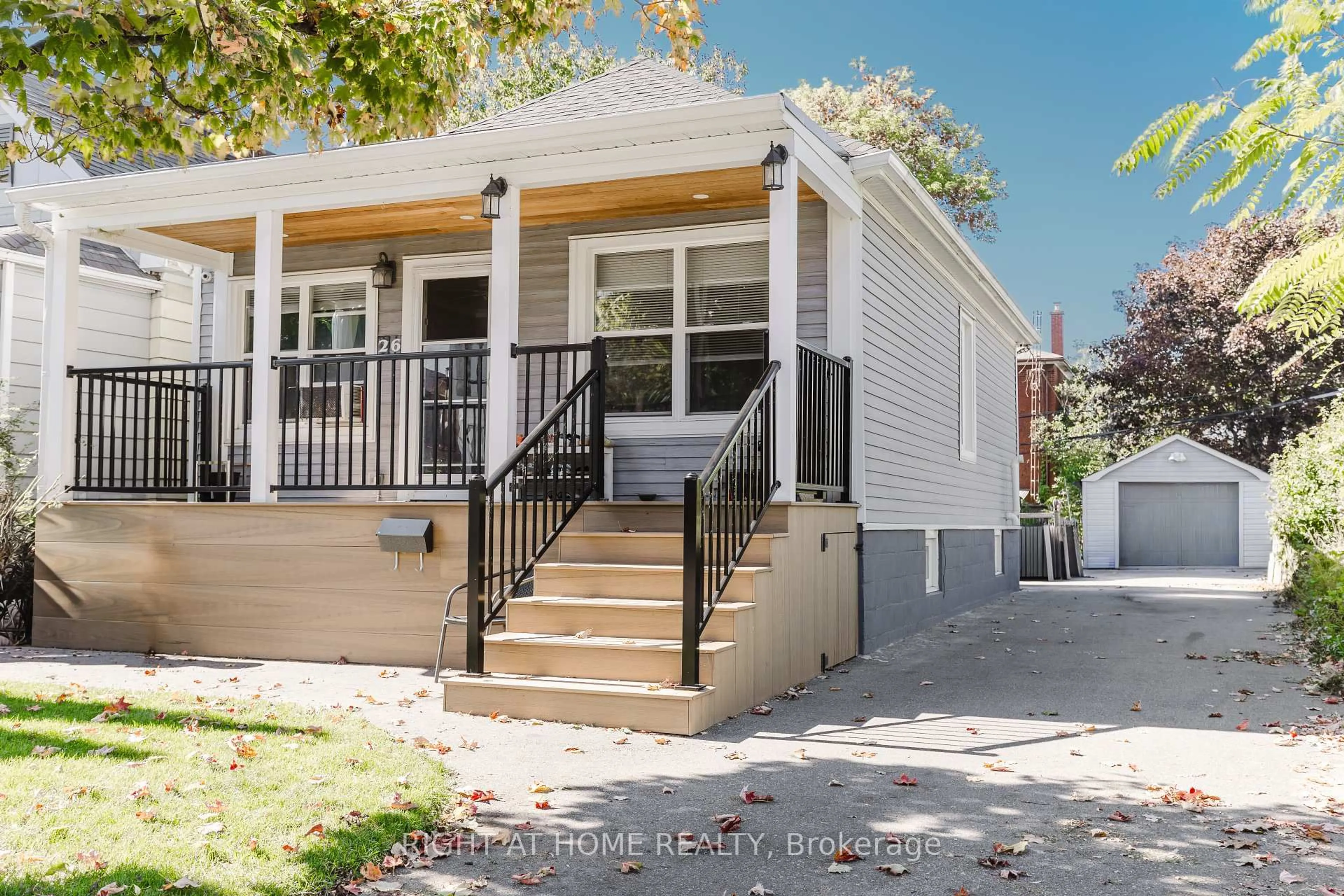 Home with vinyl exterior material, street for 26 Sixteenth St, Toronto Ontario M8V 3J8