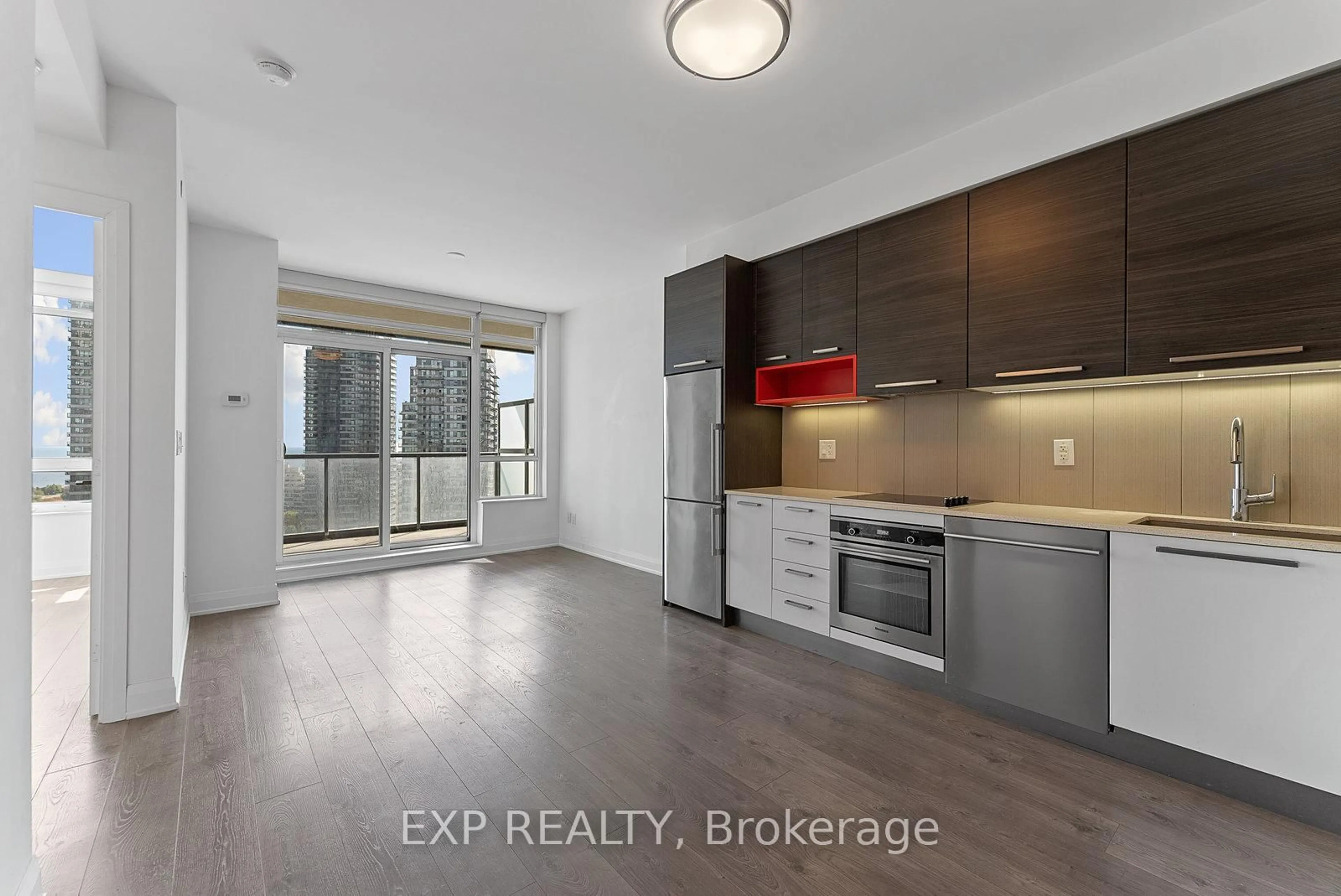 Open concept kitchen, wood/laminate floor for 36 Park Lawn Rd #1601, Toronto Ontario M8V 0E5