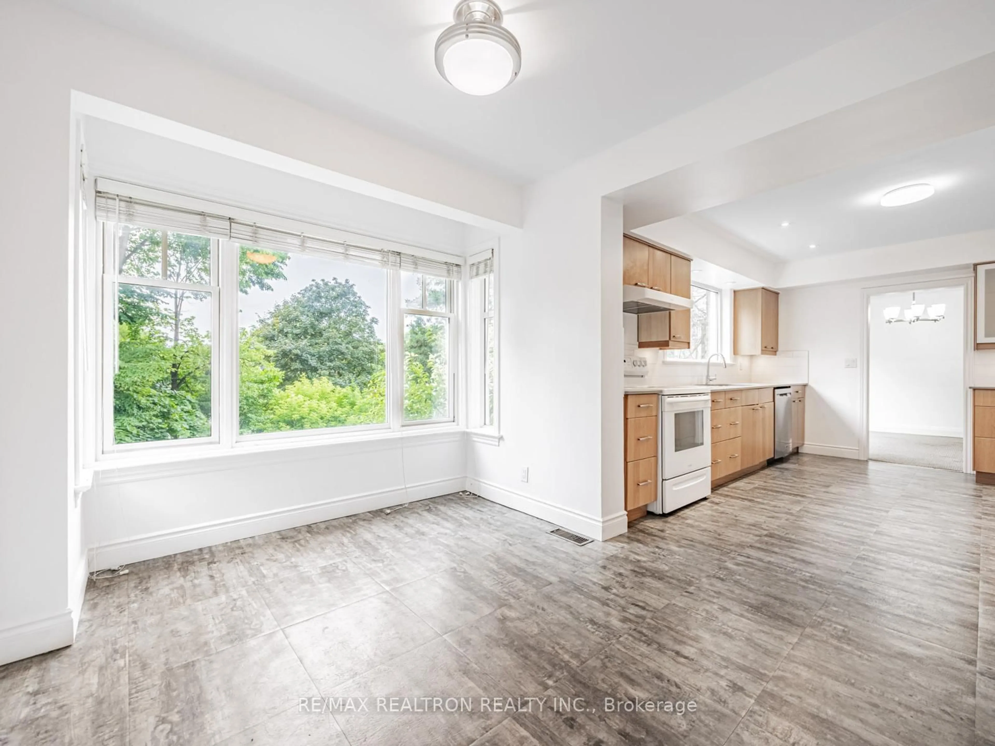 Open concept kitchen, unknown for 252 Ellis Ave, Toronto Ontario M6S 2X2