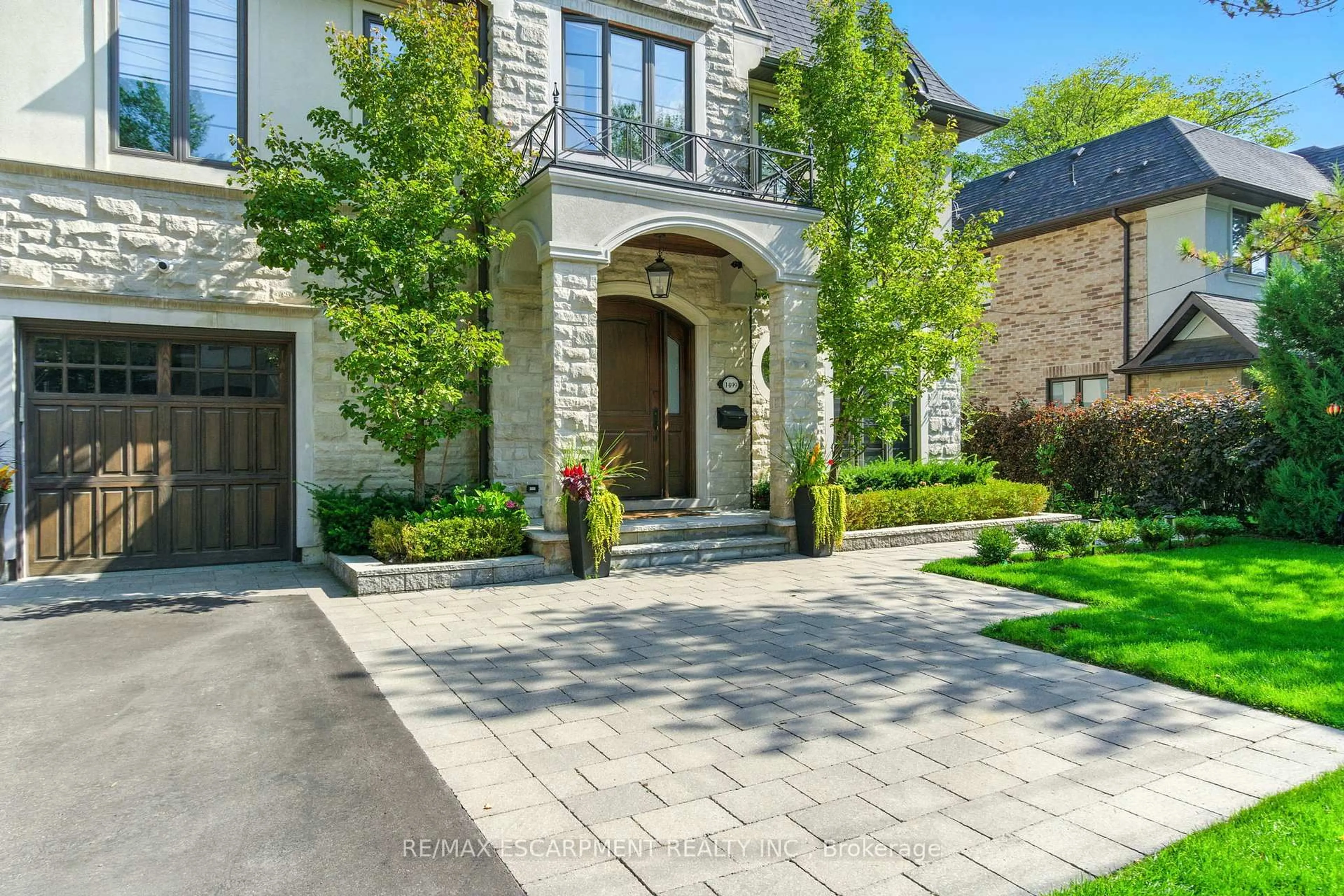 Home with brick exterior material, street for 1499 Trotwood Ave, Mississauga Ontario L5G 3Z8