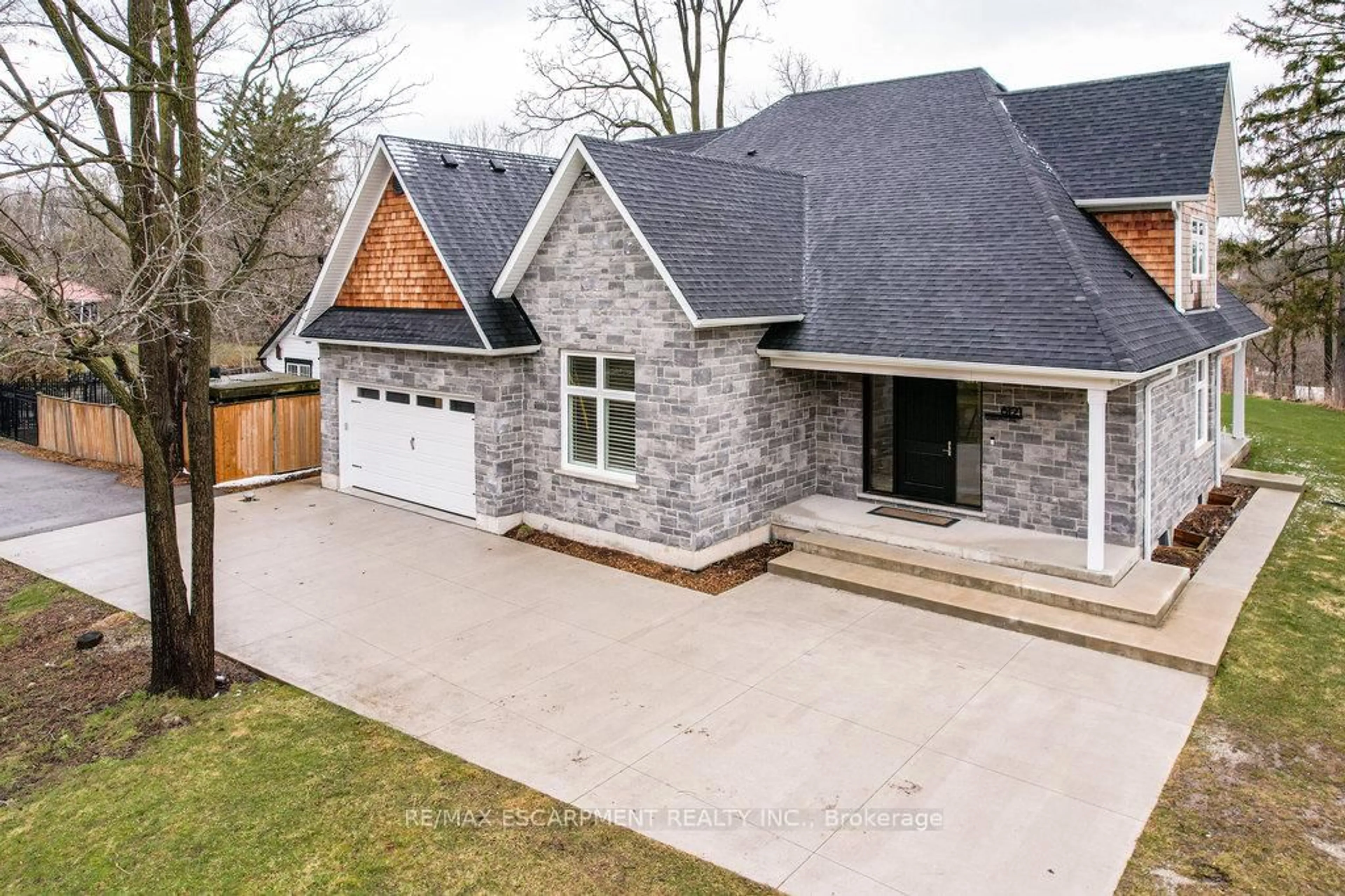 Home with brick exterior material, street for 6121 Guelph Line, Burlington Ontario L7P 0A6