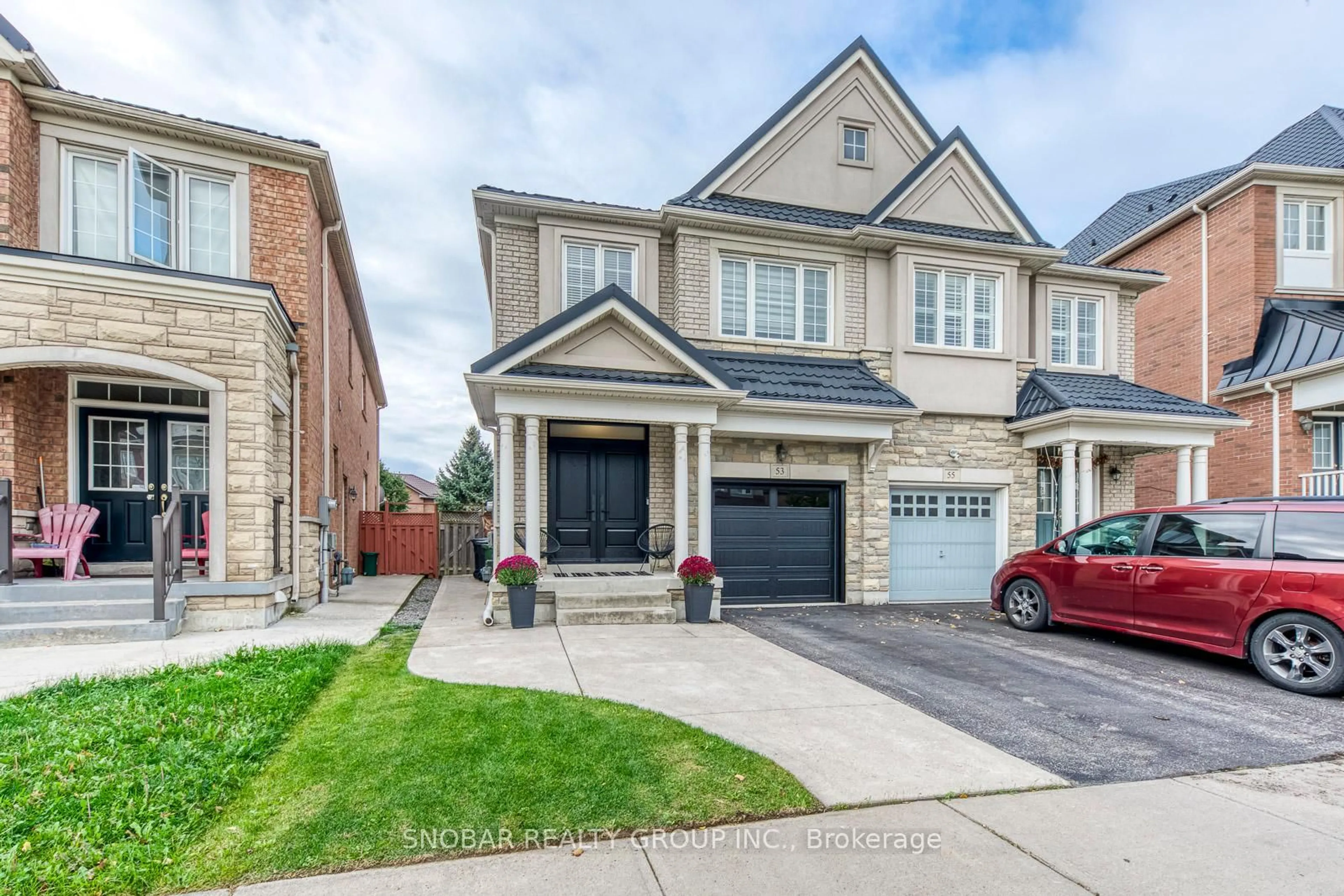 Home with brick exterior material, street for 53 Westowanis Dr, Toronto Ontario M9W 0C3