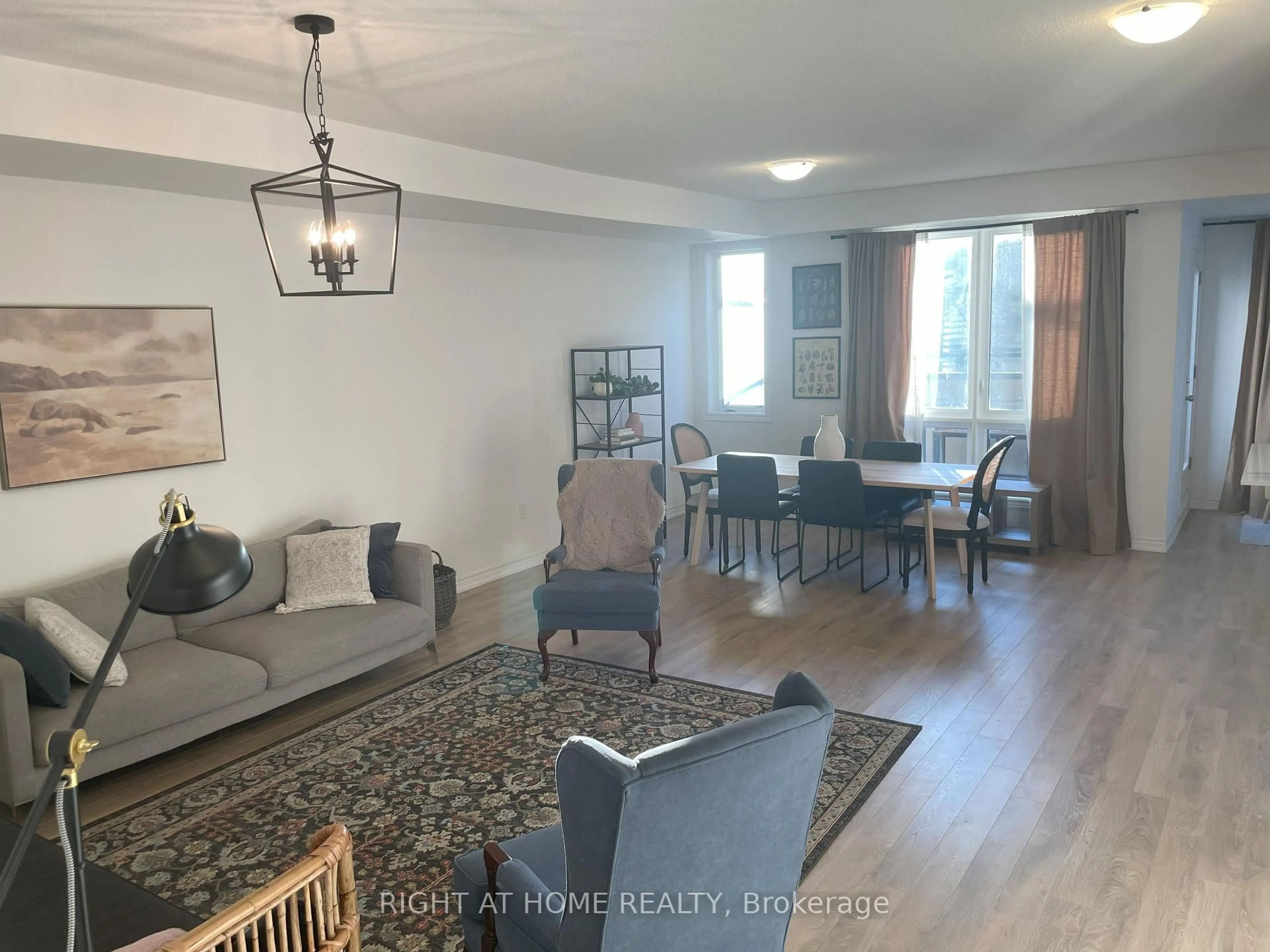 Living room with furniture, wood/laminate floor for 9440 The Gore Rd #45, Brampton Ontario L6P 4P9