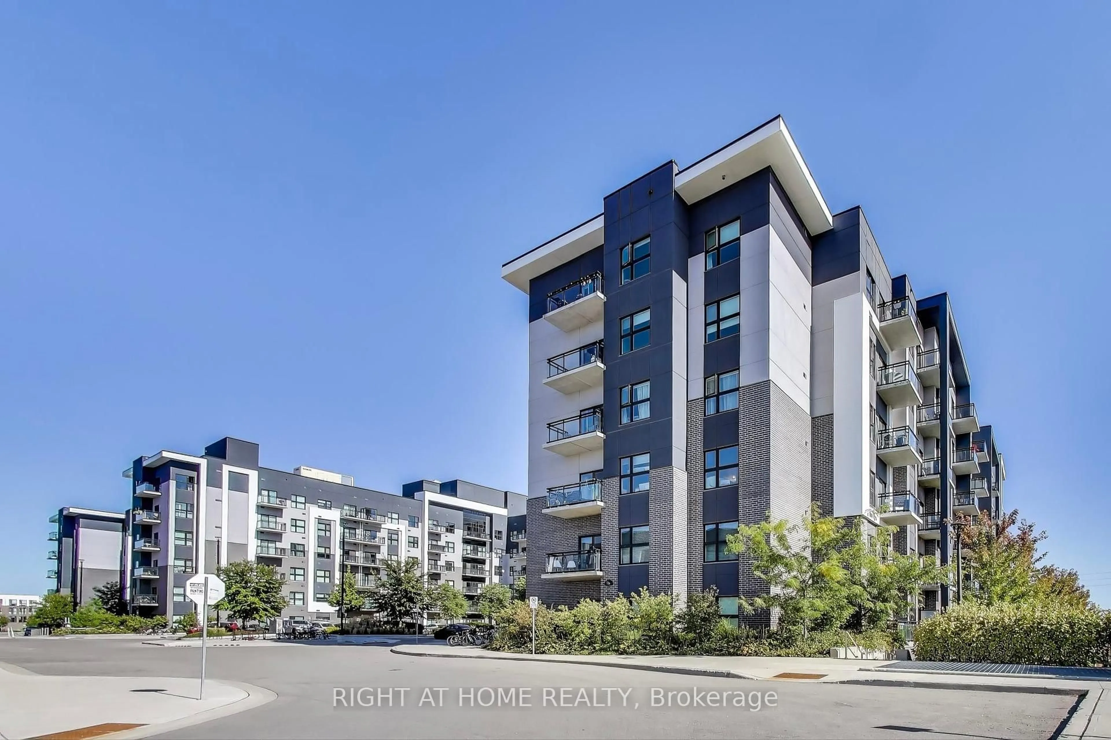 A pic from outside/outdoor area/front of a property/back of a property/a pic from drone, city buildings view from balcony for 102 Grovewood Common Circ #401, Oakville Ontario L6H 0X2