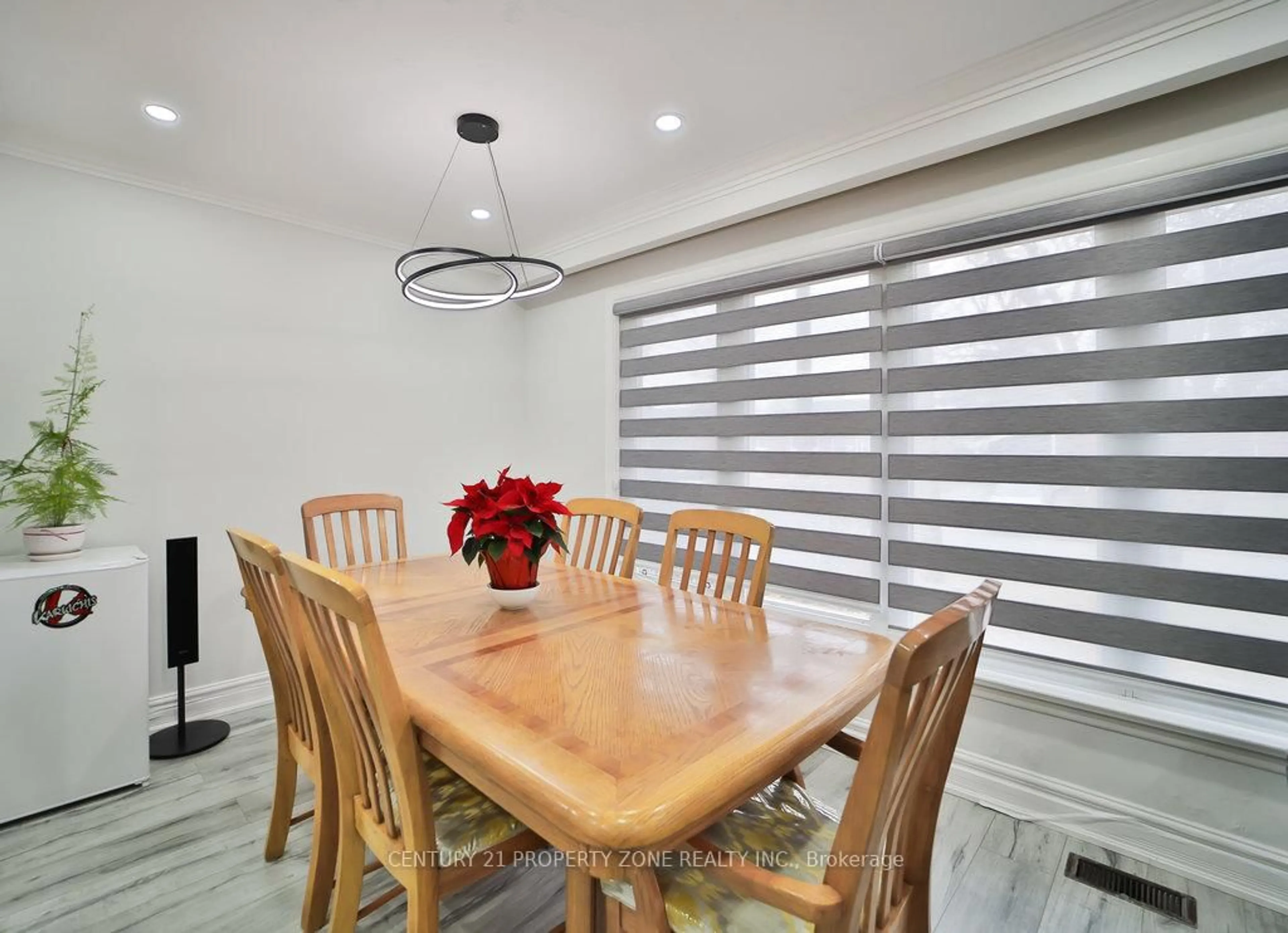 Dining room, wood/laminate floor for 47 Brisco St, Brampton Ontario L6V 1X1