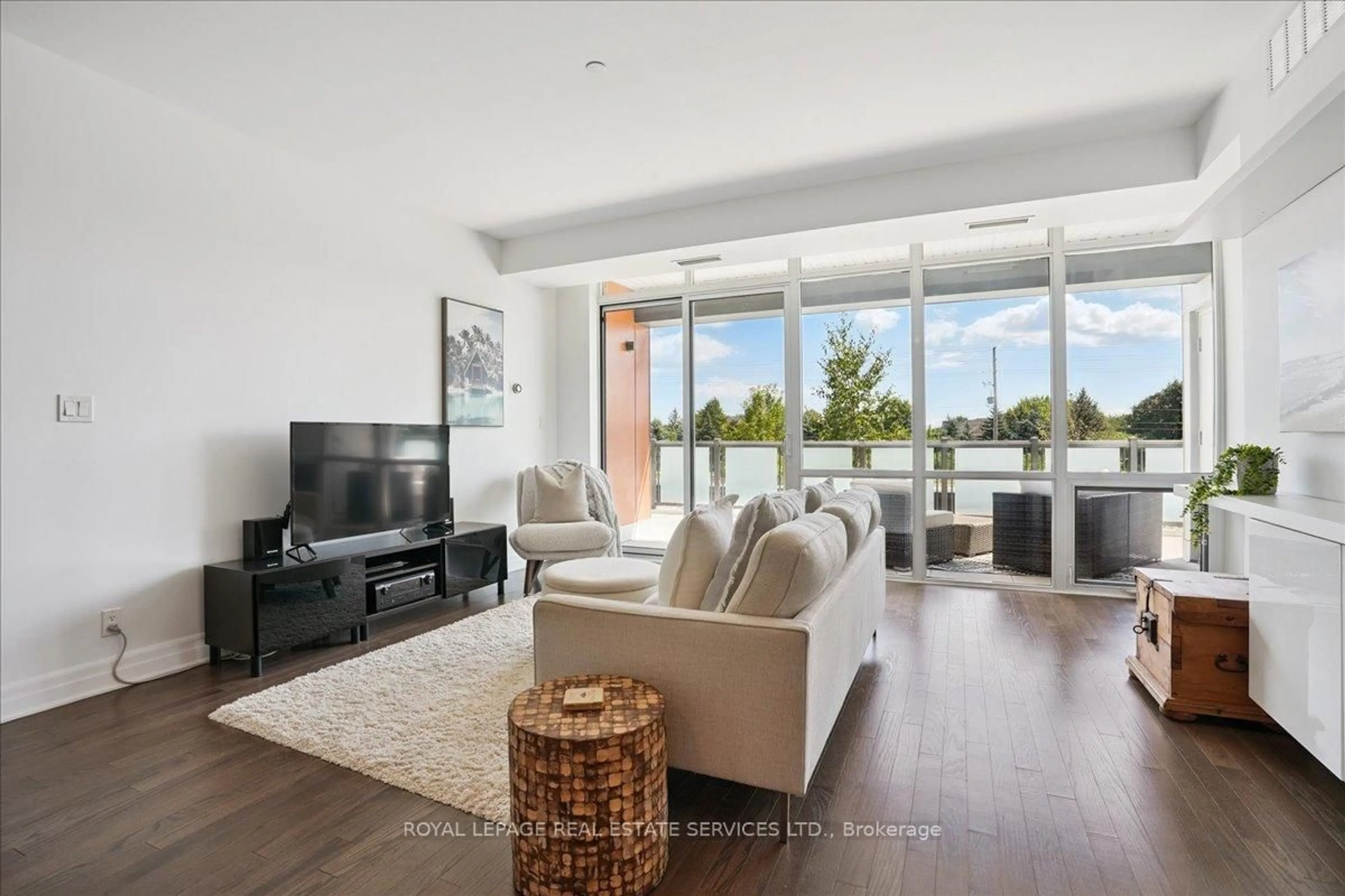 Living room with furniture, unknown for 3028 Creekshore Common #105, Oakville Ontario L6M 5K6