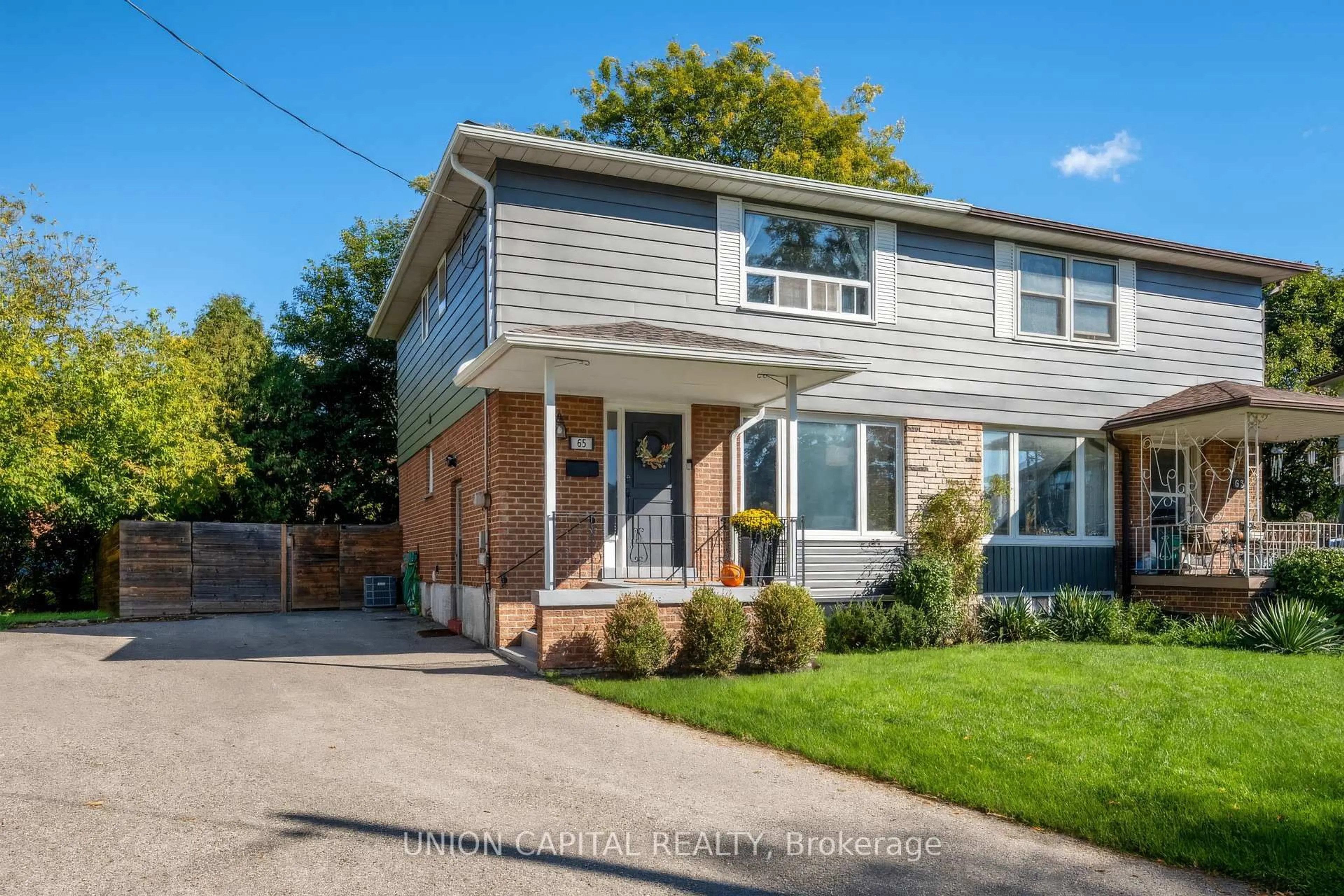 Home with brick exterior material, street for 65 Edilou Dr, Toronto Ontario M8W 4B4