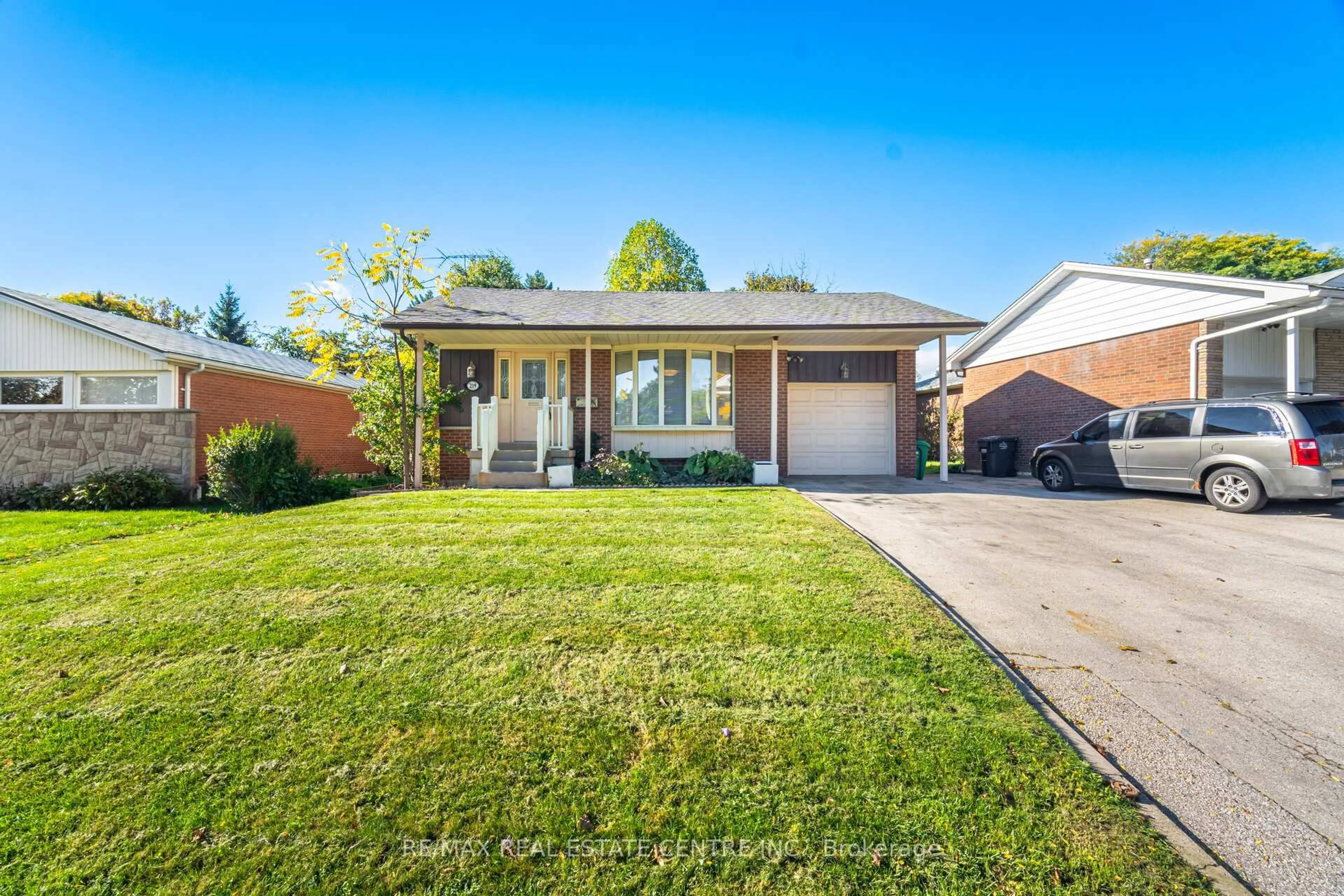 Home with brick exterior material, street for 219 Mill St, Brampton Ontario L6Y 1T9