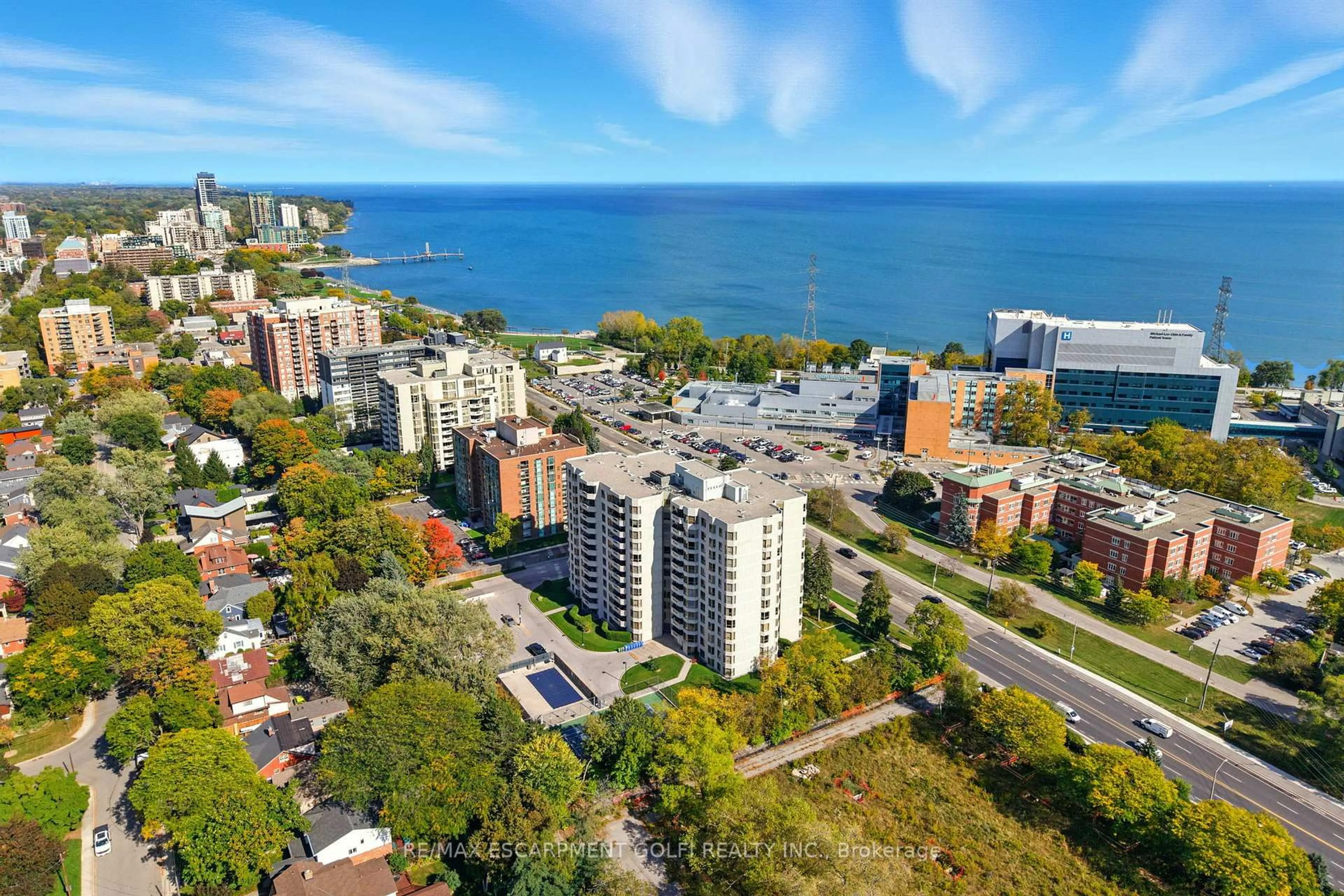 A pic from outside/outdoor area/front of a property/back of a property/a pic from drone, water/lake/river/ocean view for 1201 North Shore Blvd #208, Burlington Ontario L7S 1Z5