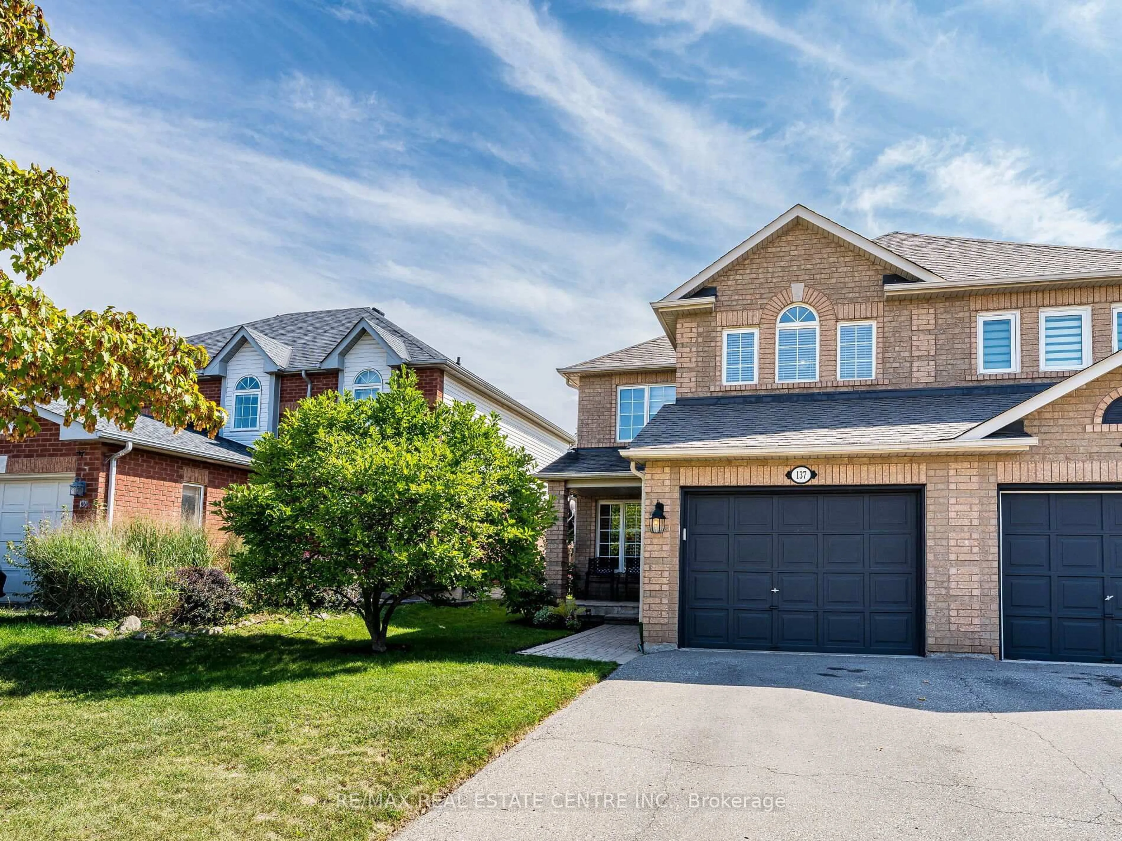 Home with brick exterior material, street for 137 Mowat Cres, Halton Hills Ontario L7G 6A8